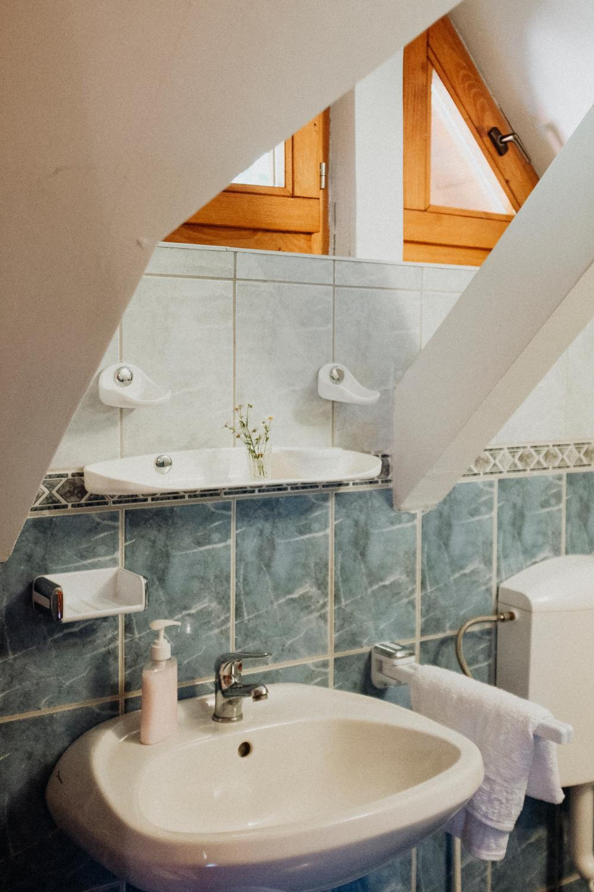 Three-Bedroom House - Photo 18