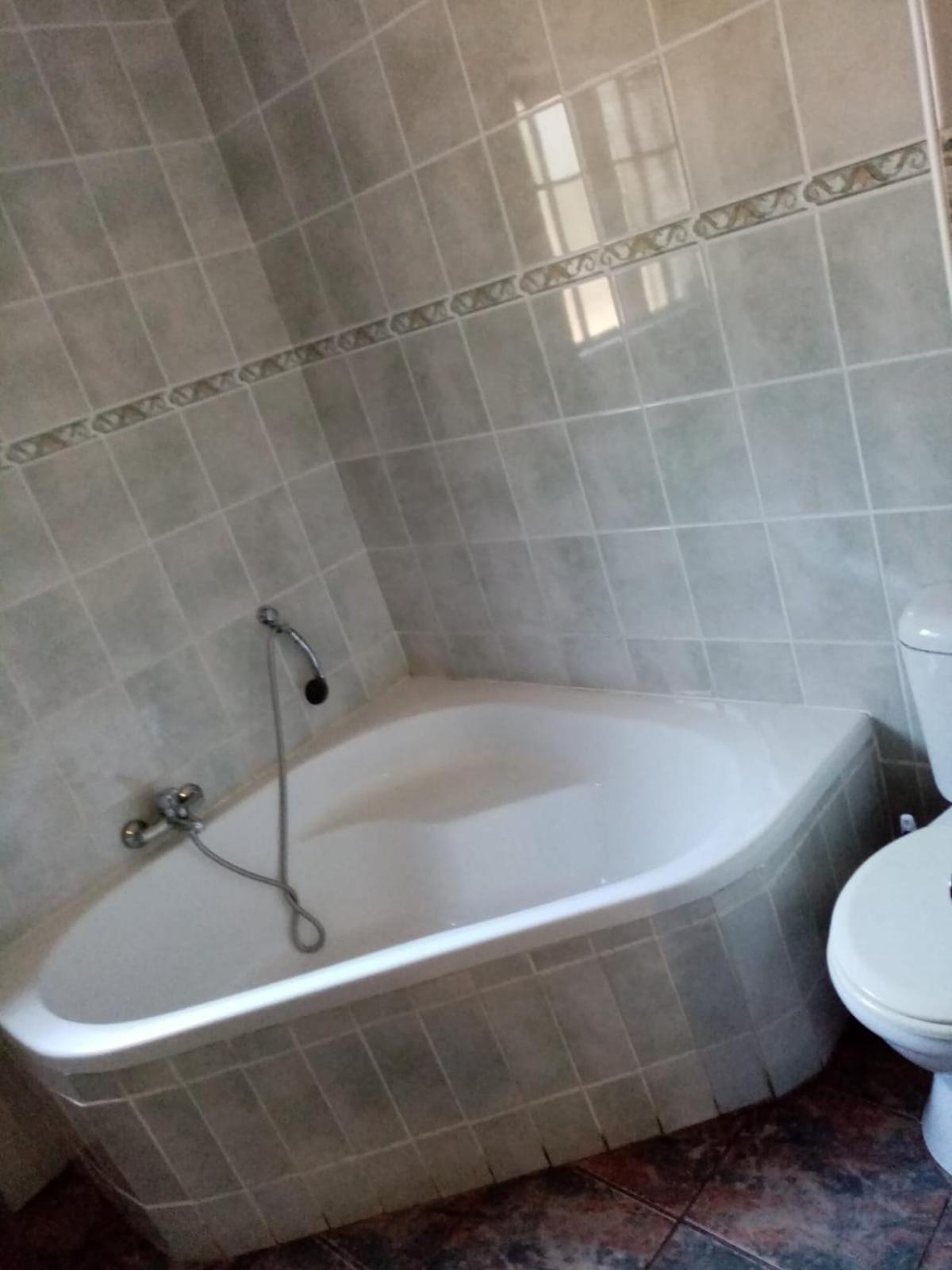 Four-Bedroom House - Photo 13