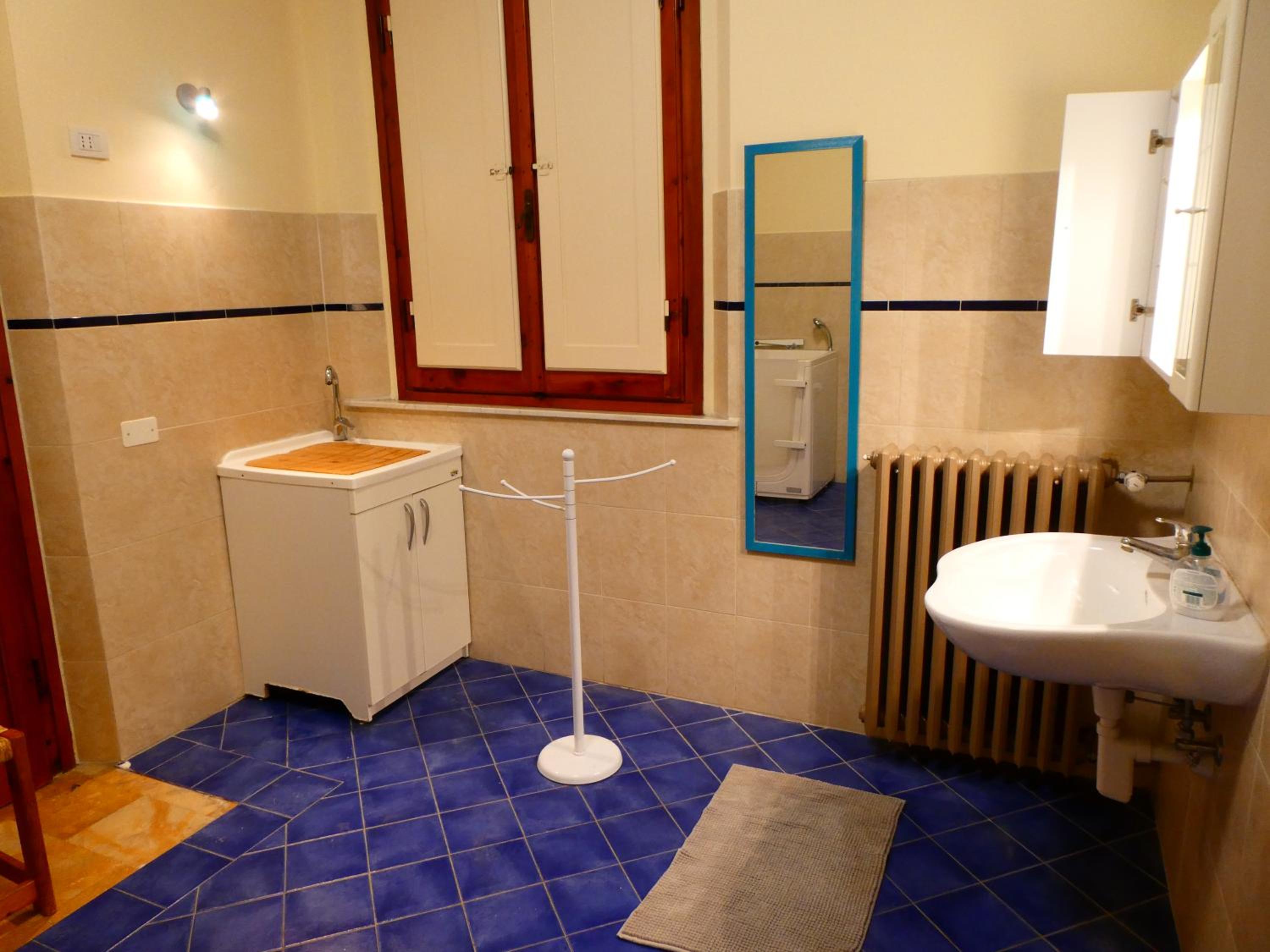 Three-Bedroom House - Photo 11