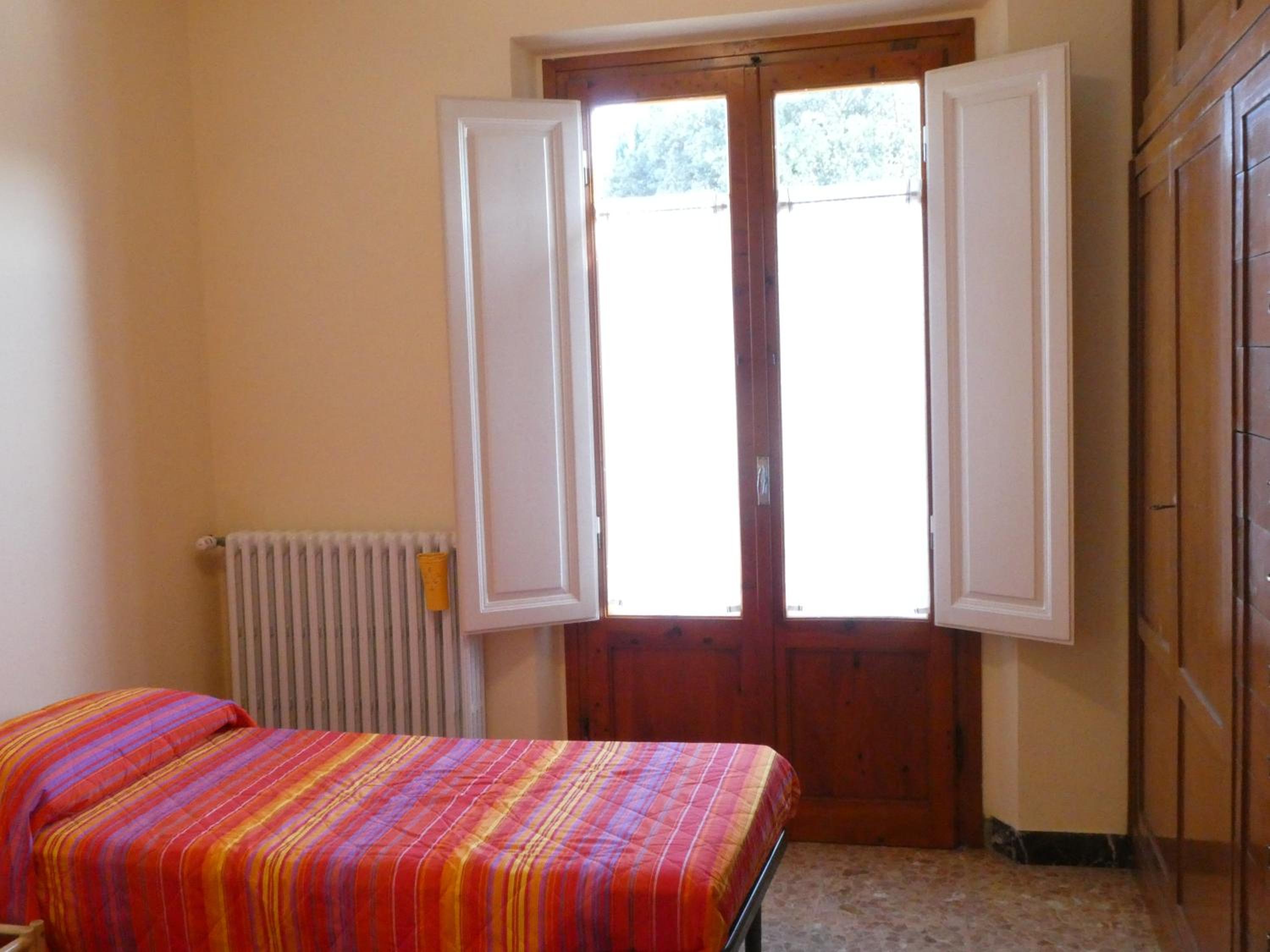 Three-Bedroom House - Photo 16