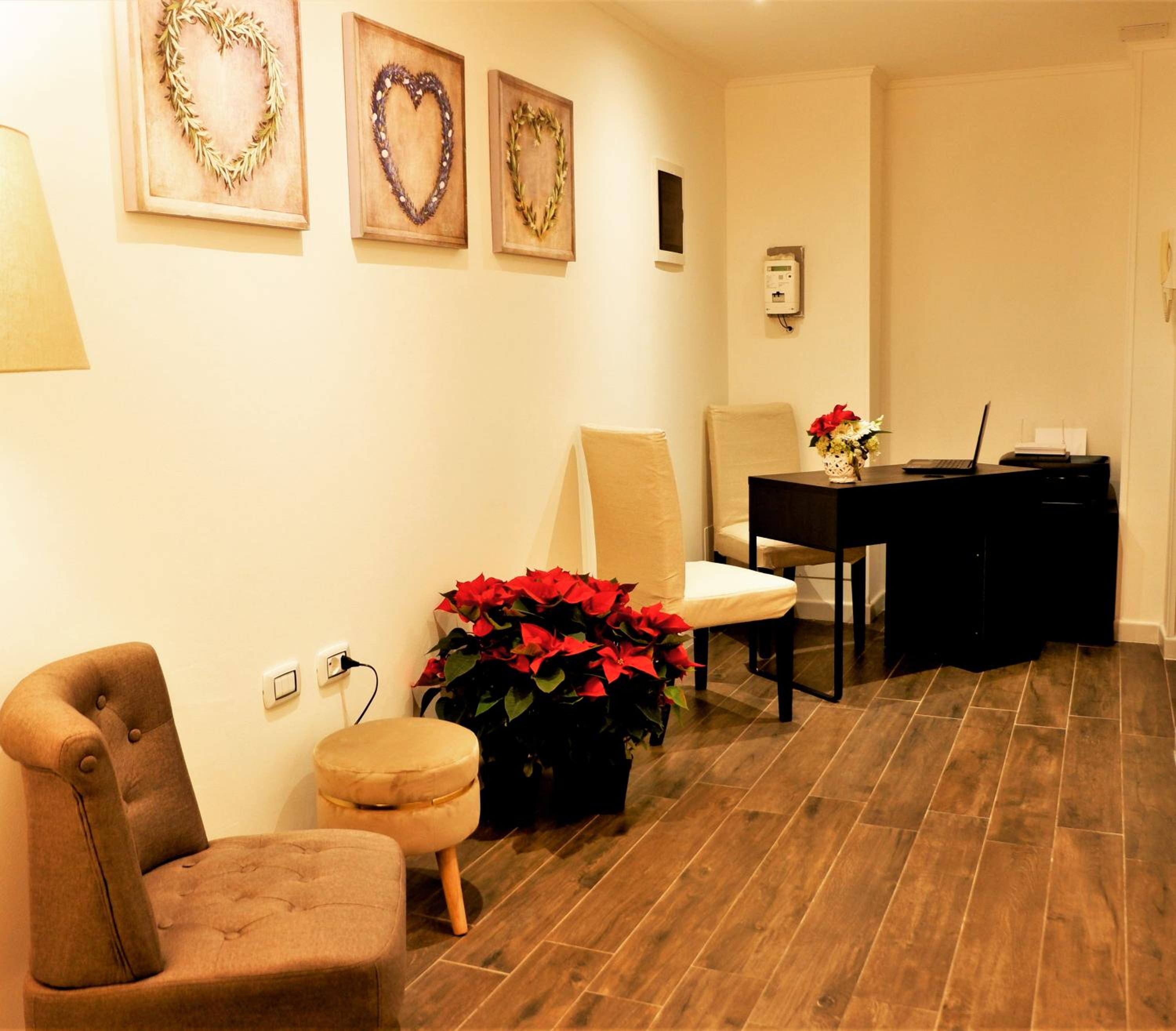 Deluxe Quadruple Room - Photo 8