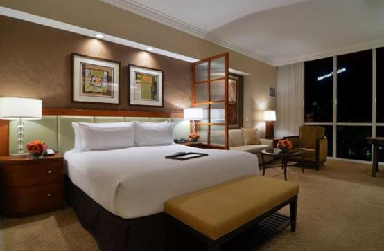 One Bedroom Balcony Suite + Deluxe Suite