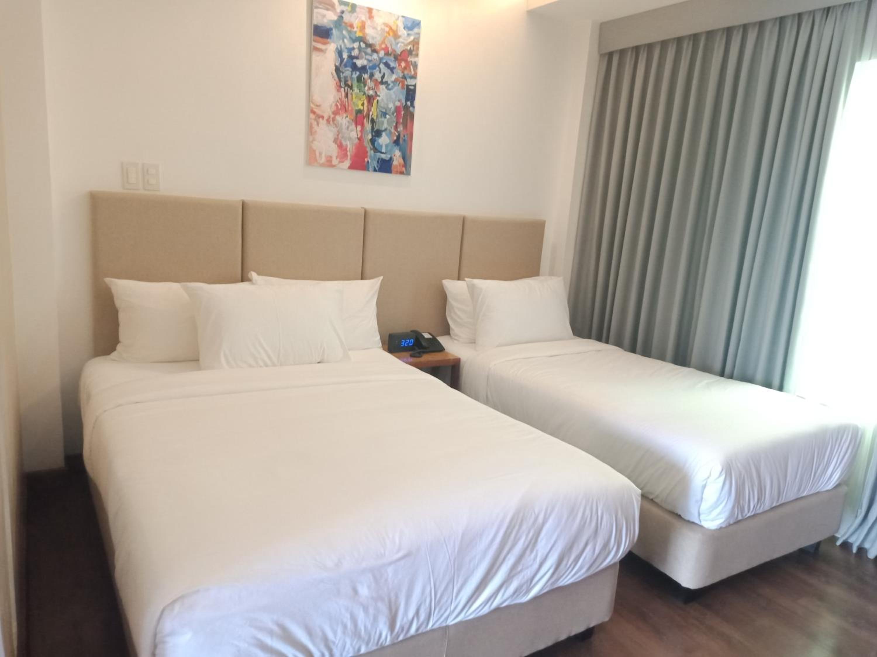 Deluxe Triple Room - Photo 2