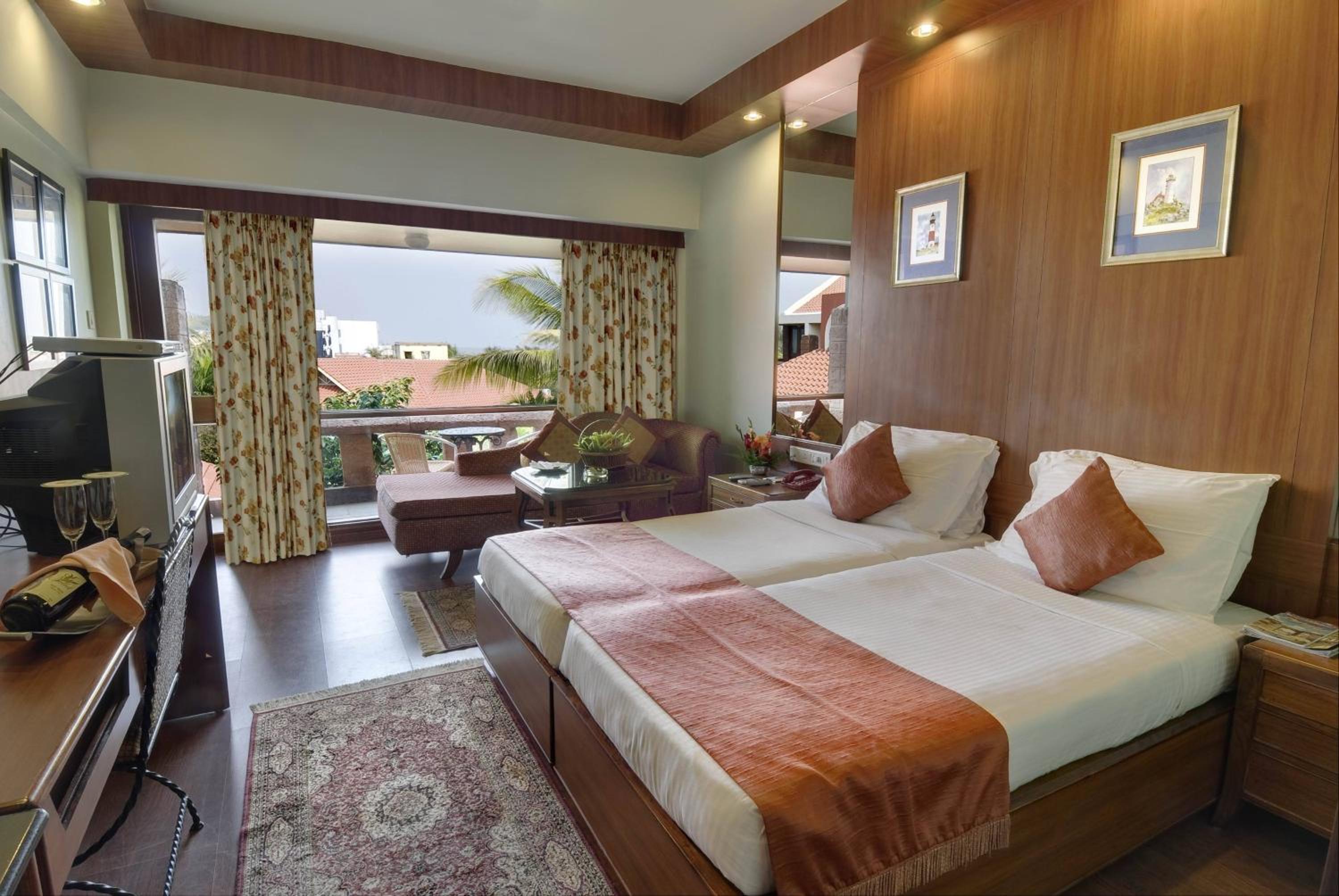 Deluxe Cottage Twin - 10% Discount on Foods & Soft Beverages* | 15% Discounts on Laundry Services* | INR 500 spa credit during your stay on selective Massage services. TnC Apply.* | Free Mini-bar - 2 cans of soft Beverages (Once on Arrival) - Photo 2