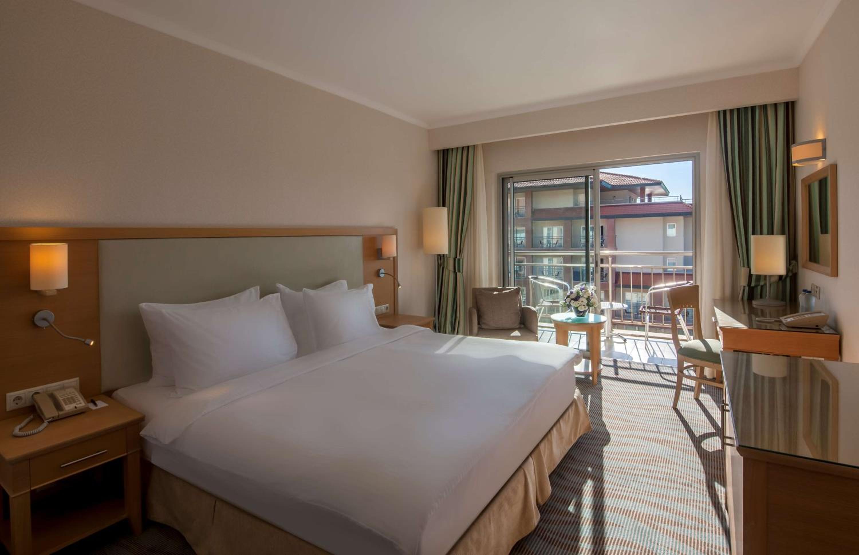 Premium Room with Balcony and Pool View - Photo 1