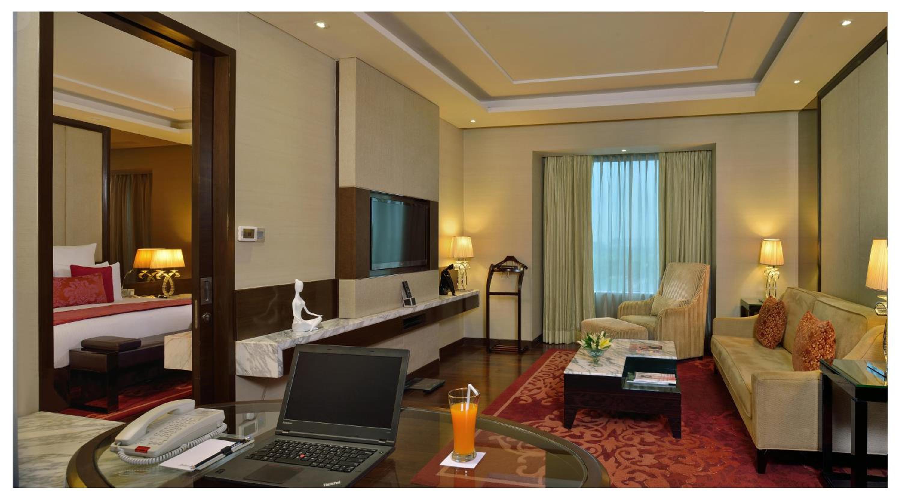 Suite with Bathtub and Living Room – Non Smoking Room with 02 beer or 02 Pegs(IMFL) or 02 Mocktails and 02 pcs laundry, Complimentary INR 500 Hotel Credit on min usage of INR 2000 at market place restaurant on Food & Soft Beverages, 50% off on Mini Bar Suite with Bathtub and Living Room – Non Smoking Room with 02 beer or 02 Pegs(IMFL) or 02 Mocktails and 02 pcs laundry, Complimentary INR 500 Hotel Credit on min usage of INR 2000 at market place restaurant on Food & Soft Beverages, 50% off on Mini Bar