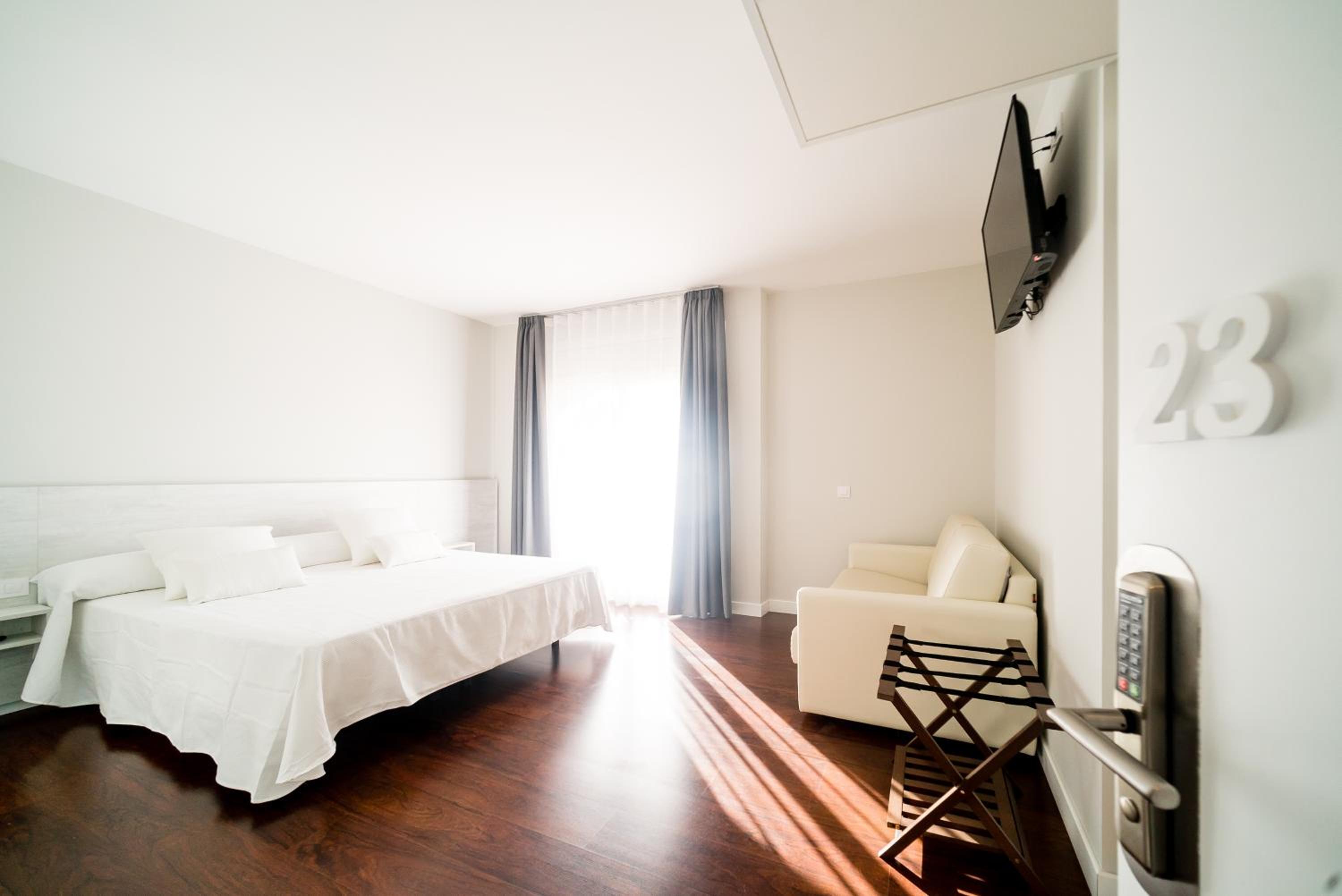 Habitación King con Balcón