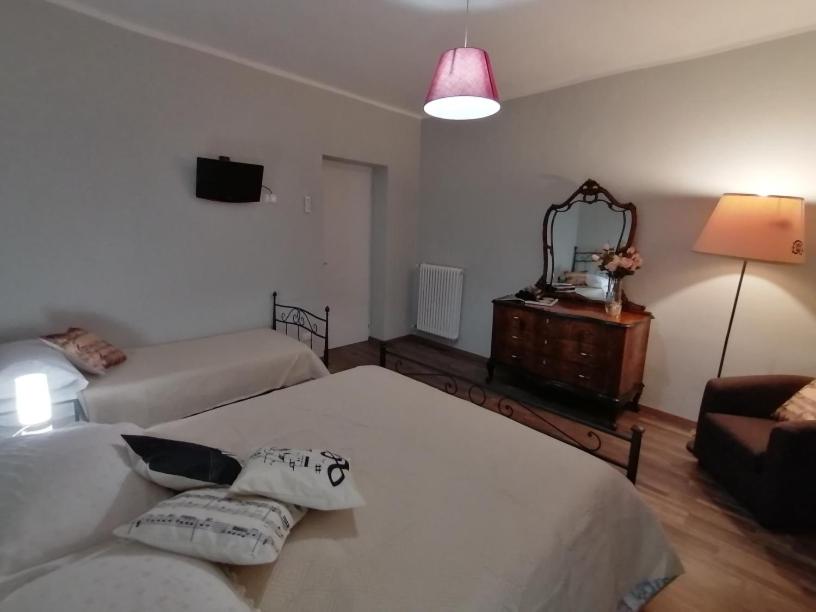 Deluxe Triple Room - Photo 17
