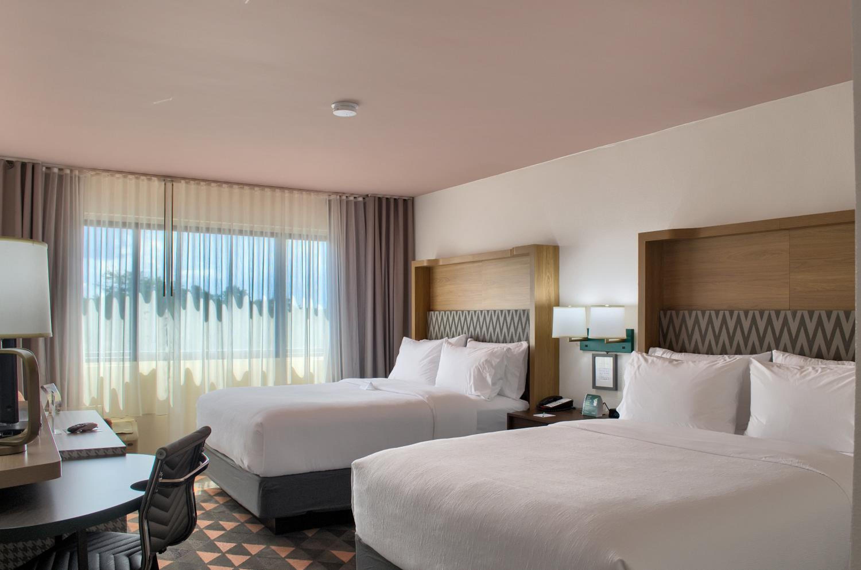 Standard Queen Room with Two Queen Beds - Photo 2