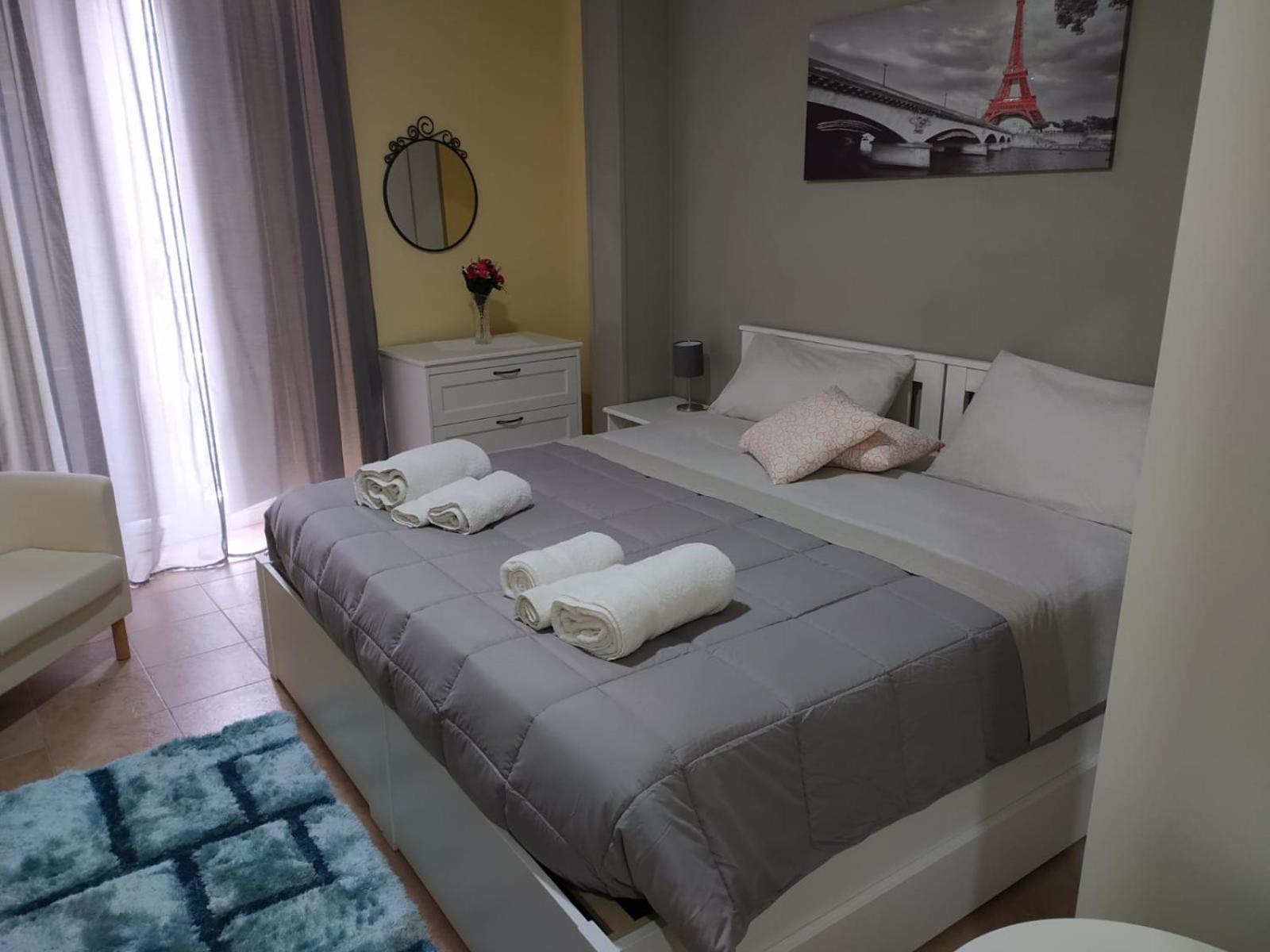 Quadruple Room with Balcony - Photo 1