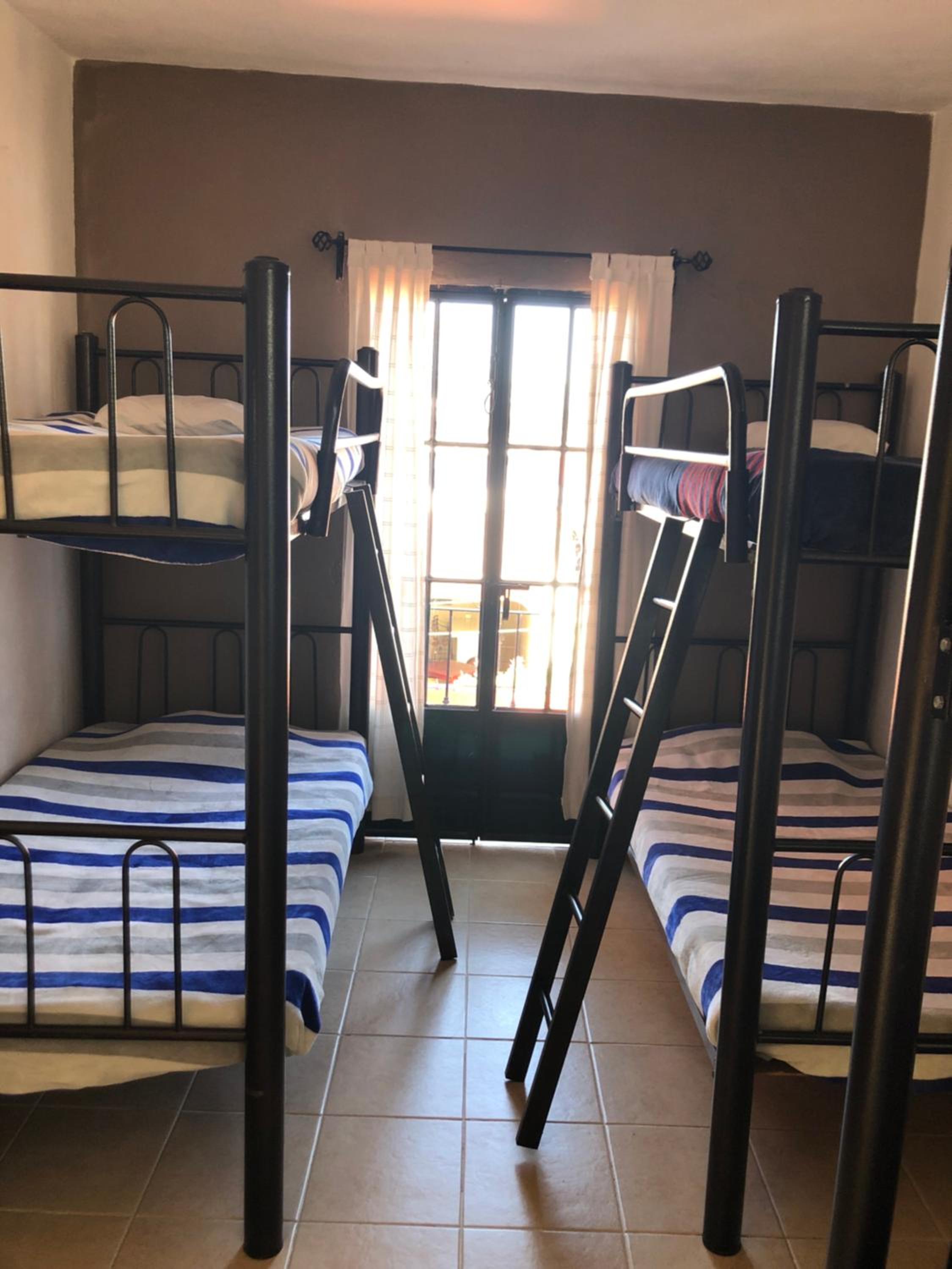 Cama em Dormitório Misto com 6 Camas