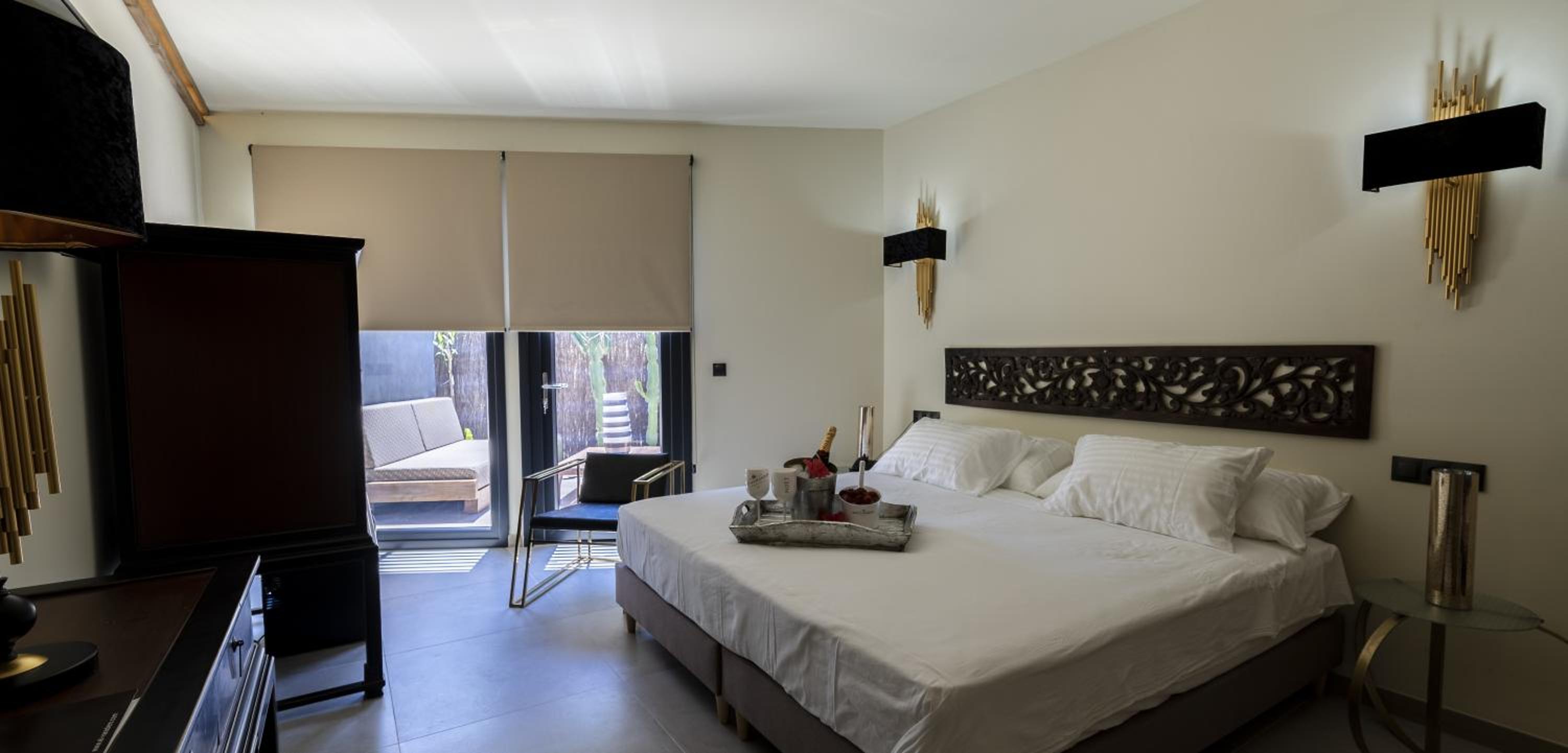 Habitación triple con zona de estar