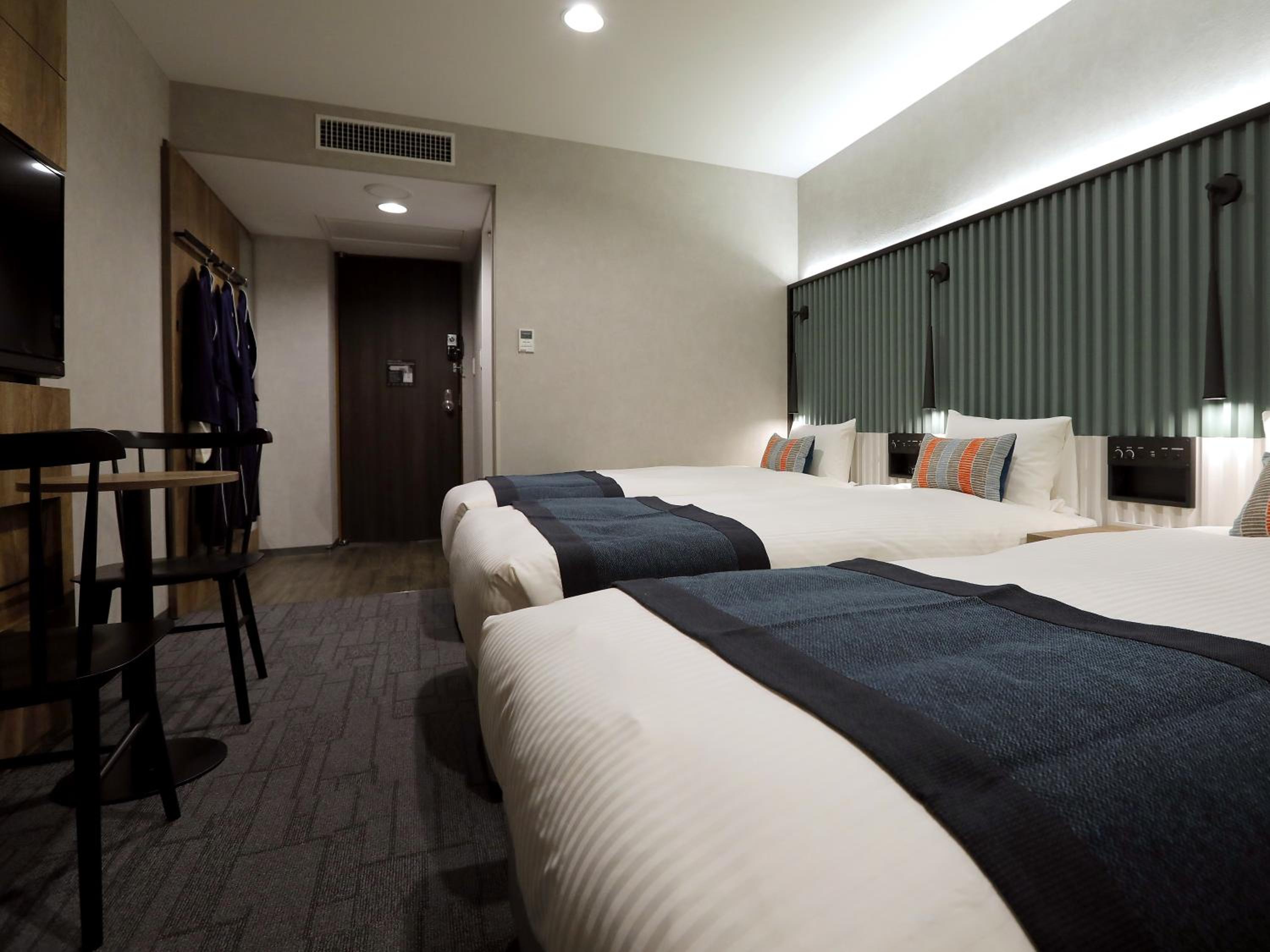 21sqm Deluxe Triple Room - Non-Smoking - Photo 2