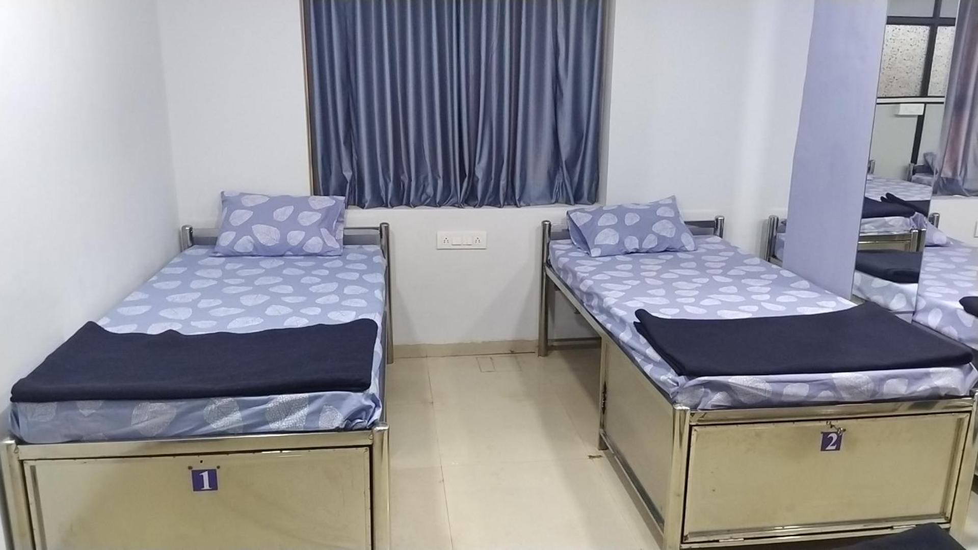 Single Bed in Male Dormitory Room photo 1