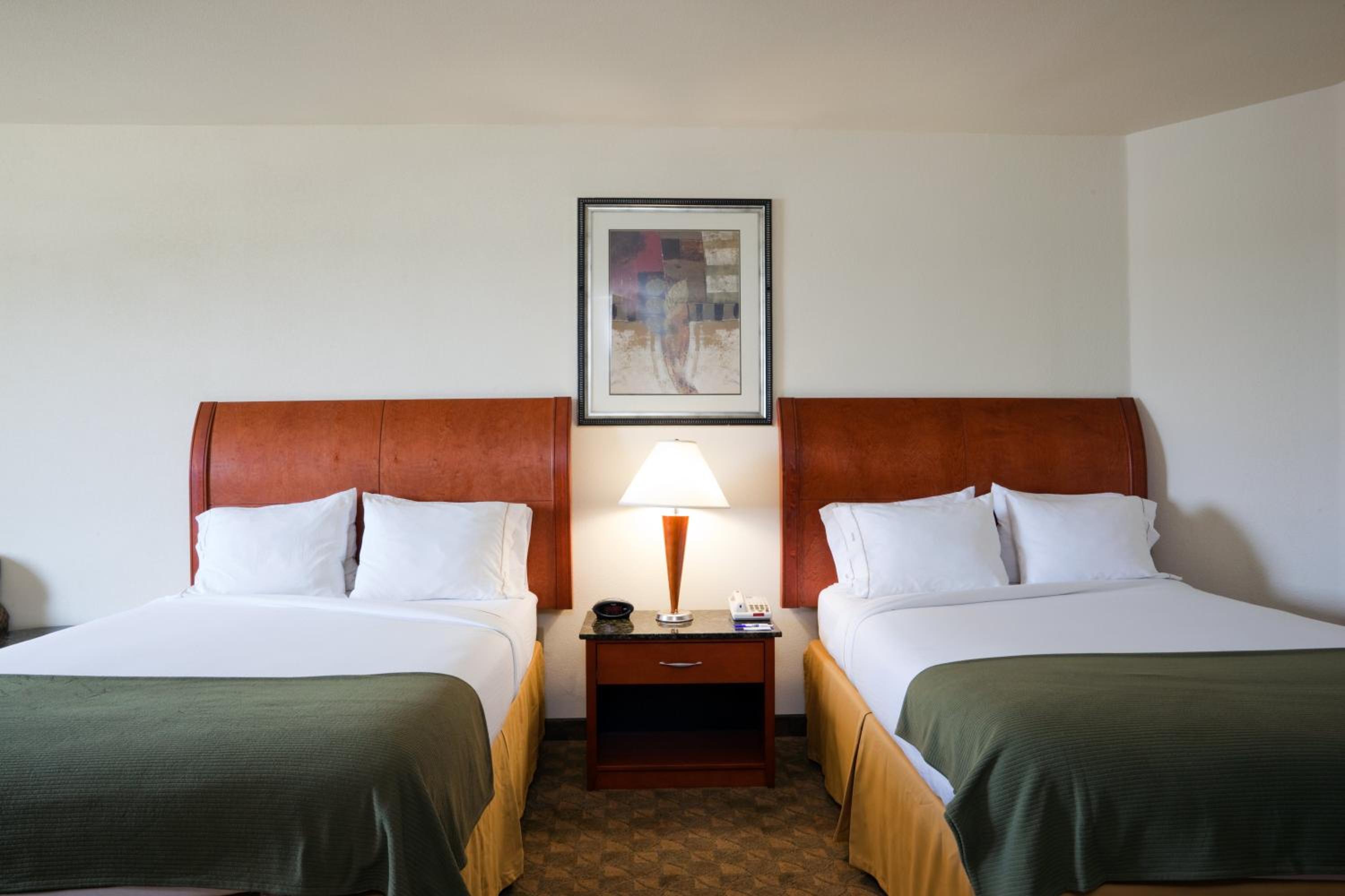 Standard Queen Room with Two Queen Beds and Extra Floor Space - Photo 1