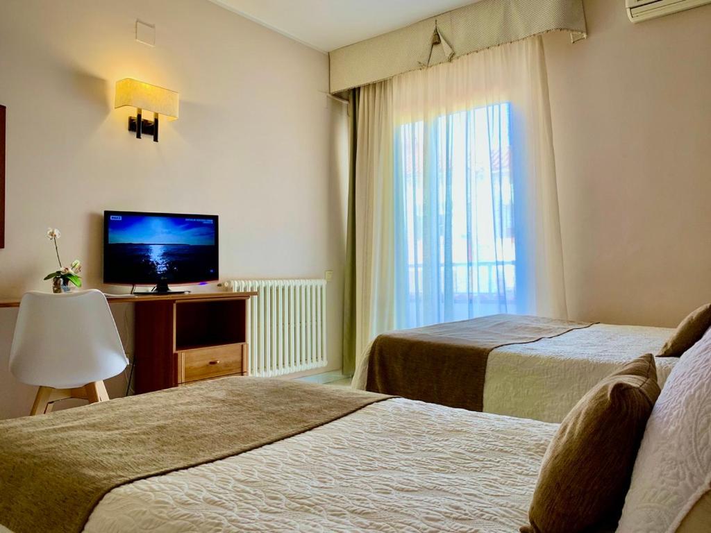 Habitación Triple con Balcón