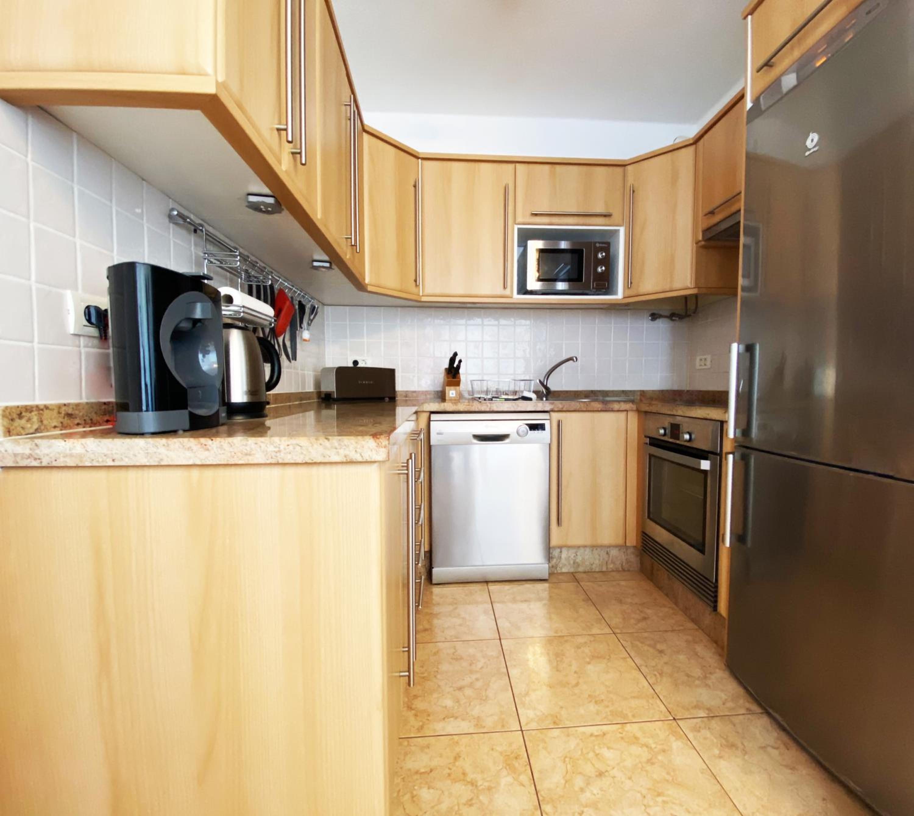 Three-Bedroom Apartment - Photo 2