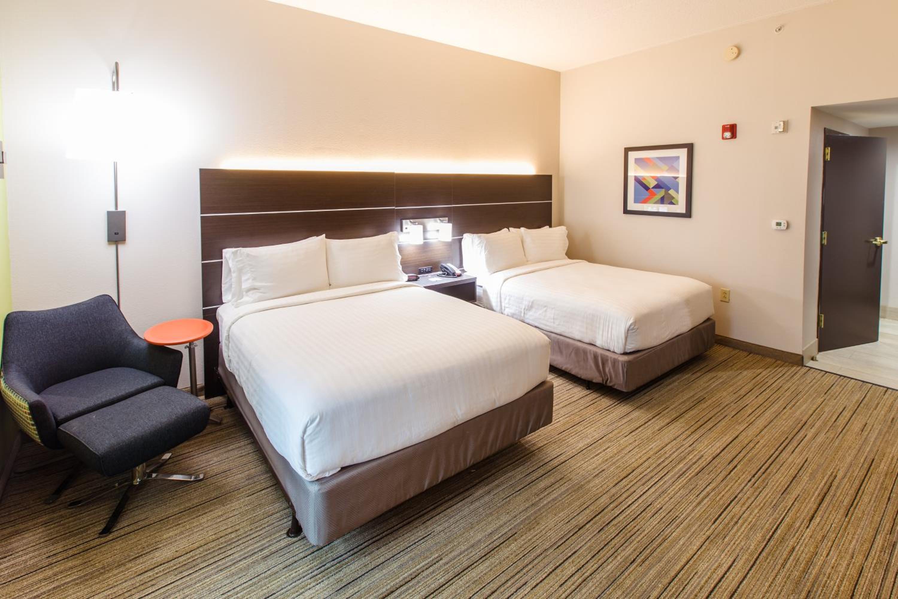 Queen Suite with Two Queen Beds and Sofa Bed - Photo 1