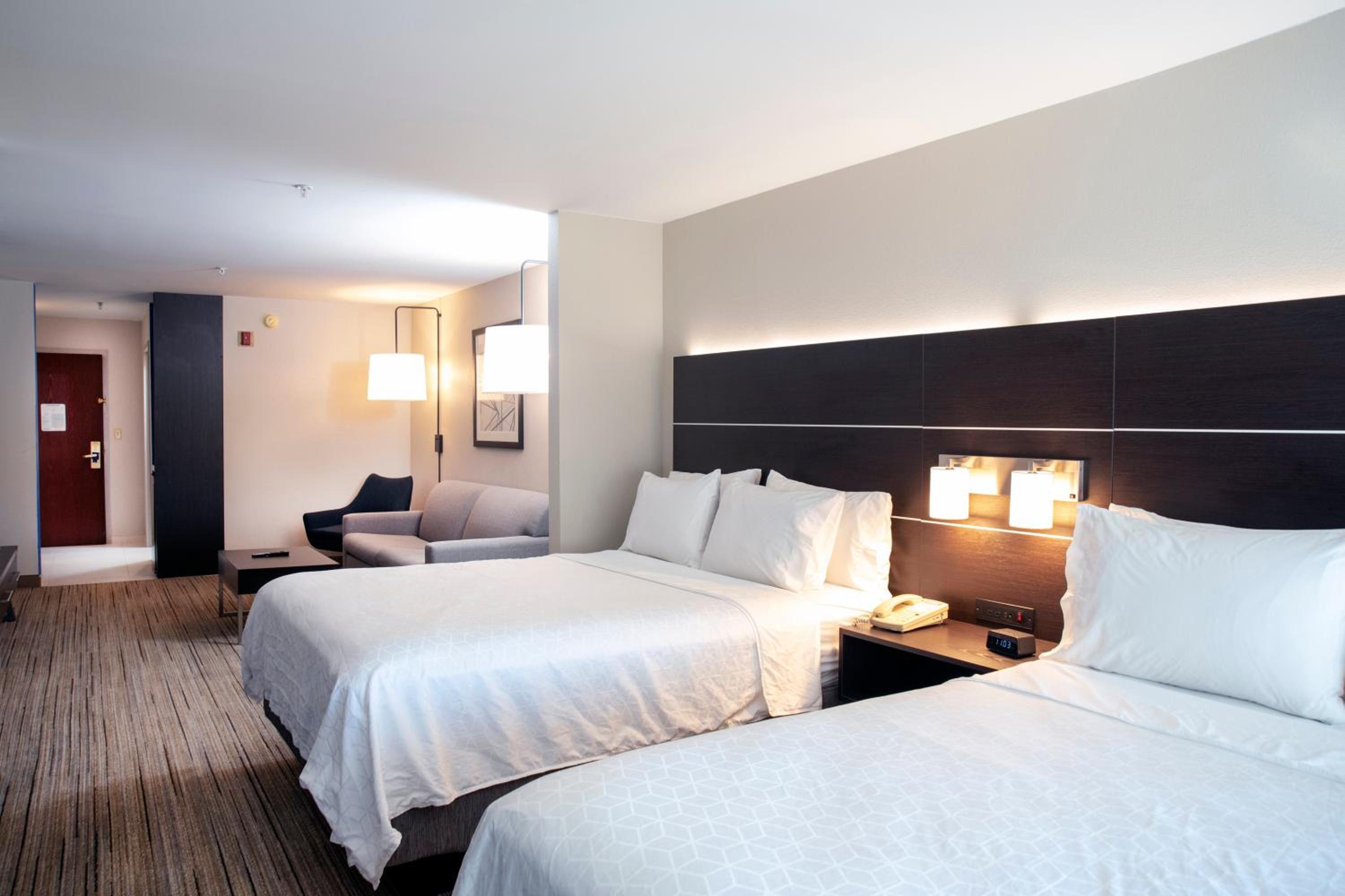 Queen Suite with Two Queen Beds and Sofa Bed - Photo 1