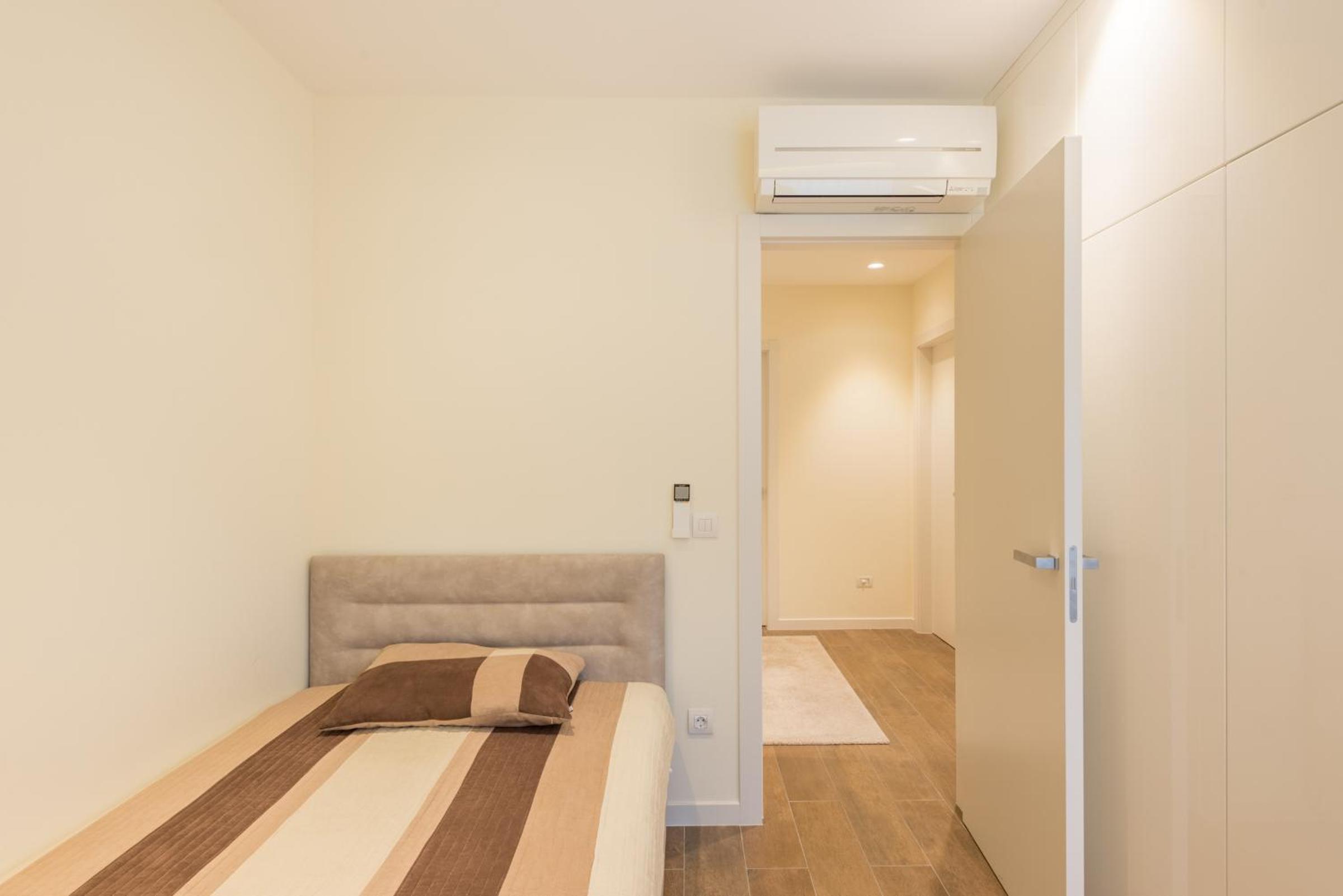 Three-Bedroom Apartment photo 1