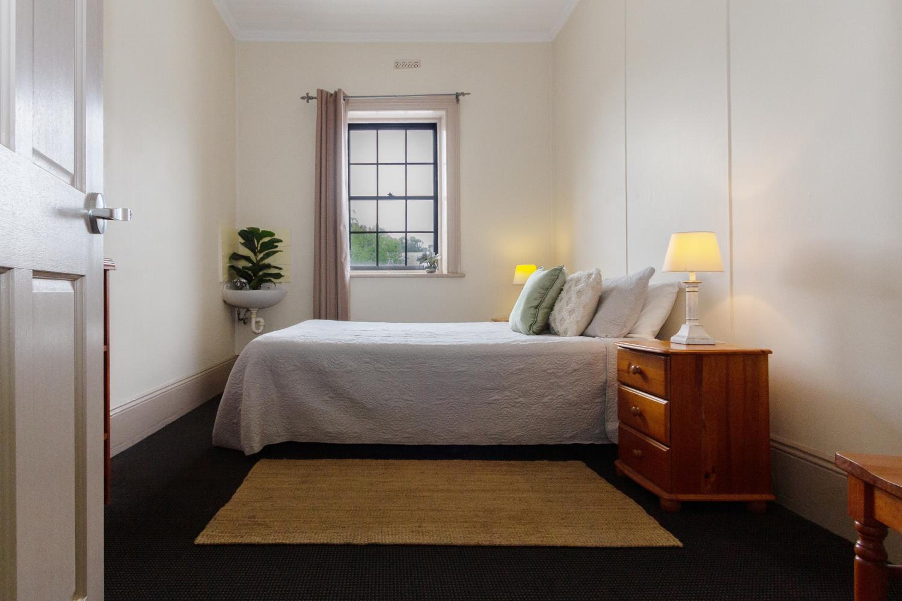 Queen Room with Shared Bathroom