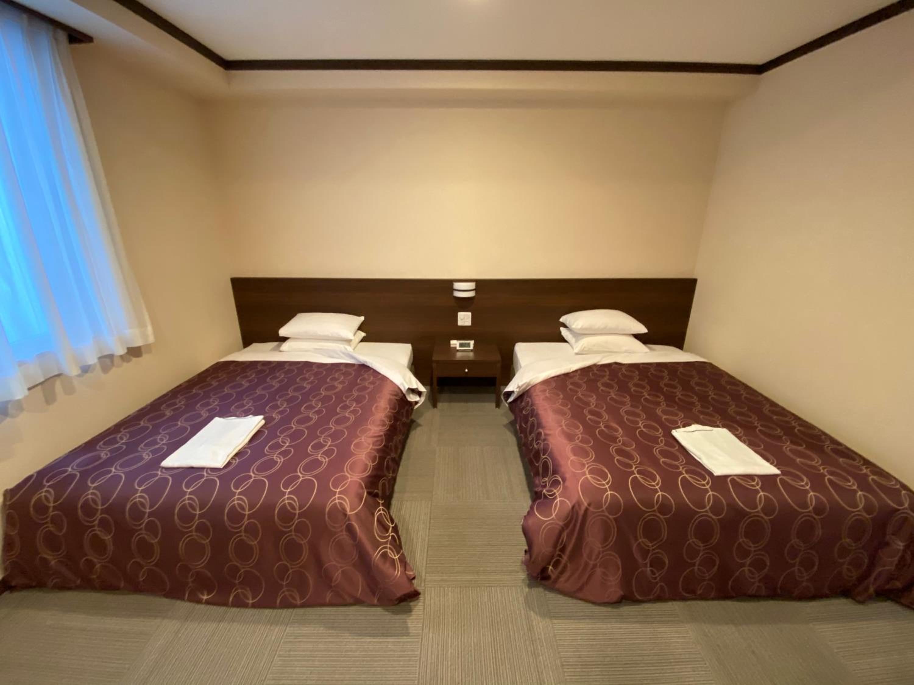 Twin Room - Photo 1