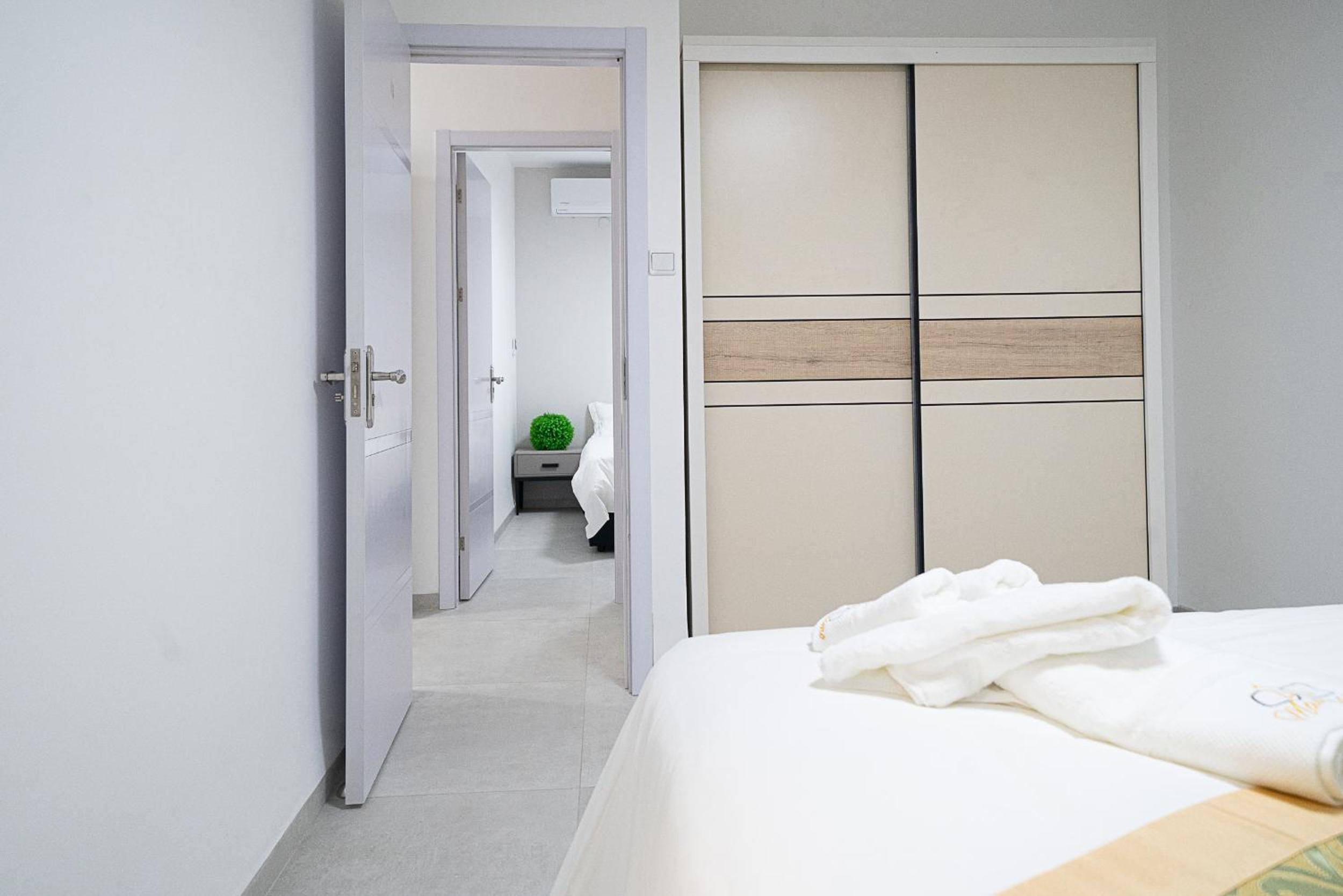 Three-Bedroom Apartment - Photo 2