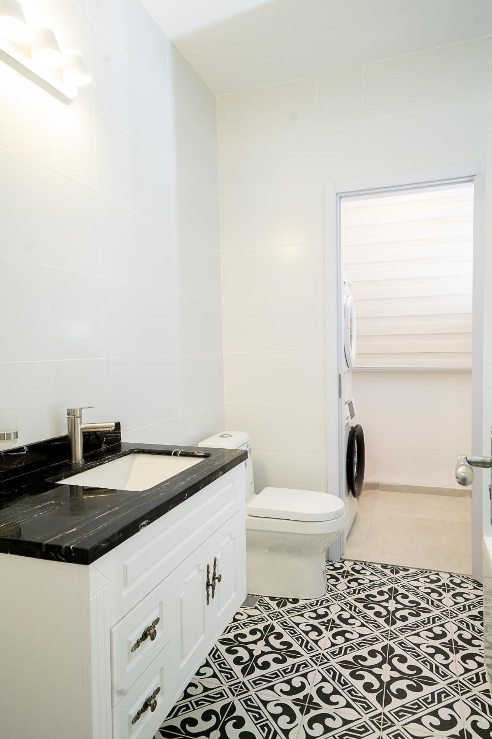 Three-Bedroom Apartment - Photo 18
