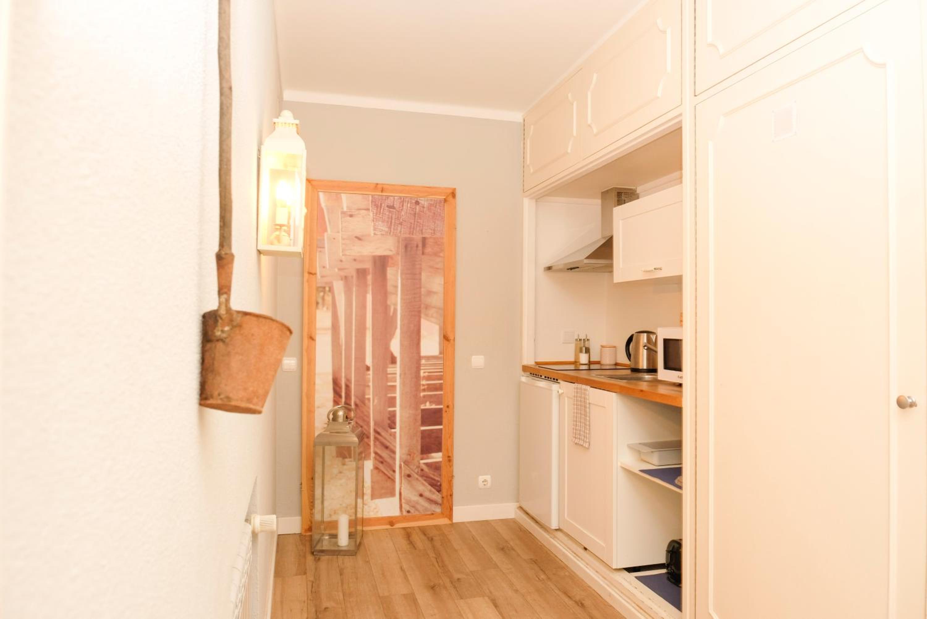 Three-Bedroom Apartment - Photo 25