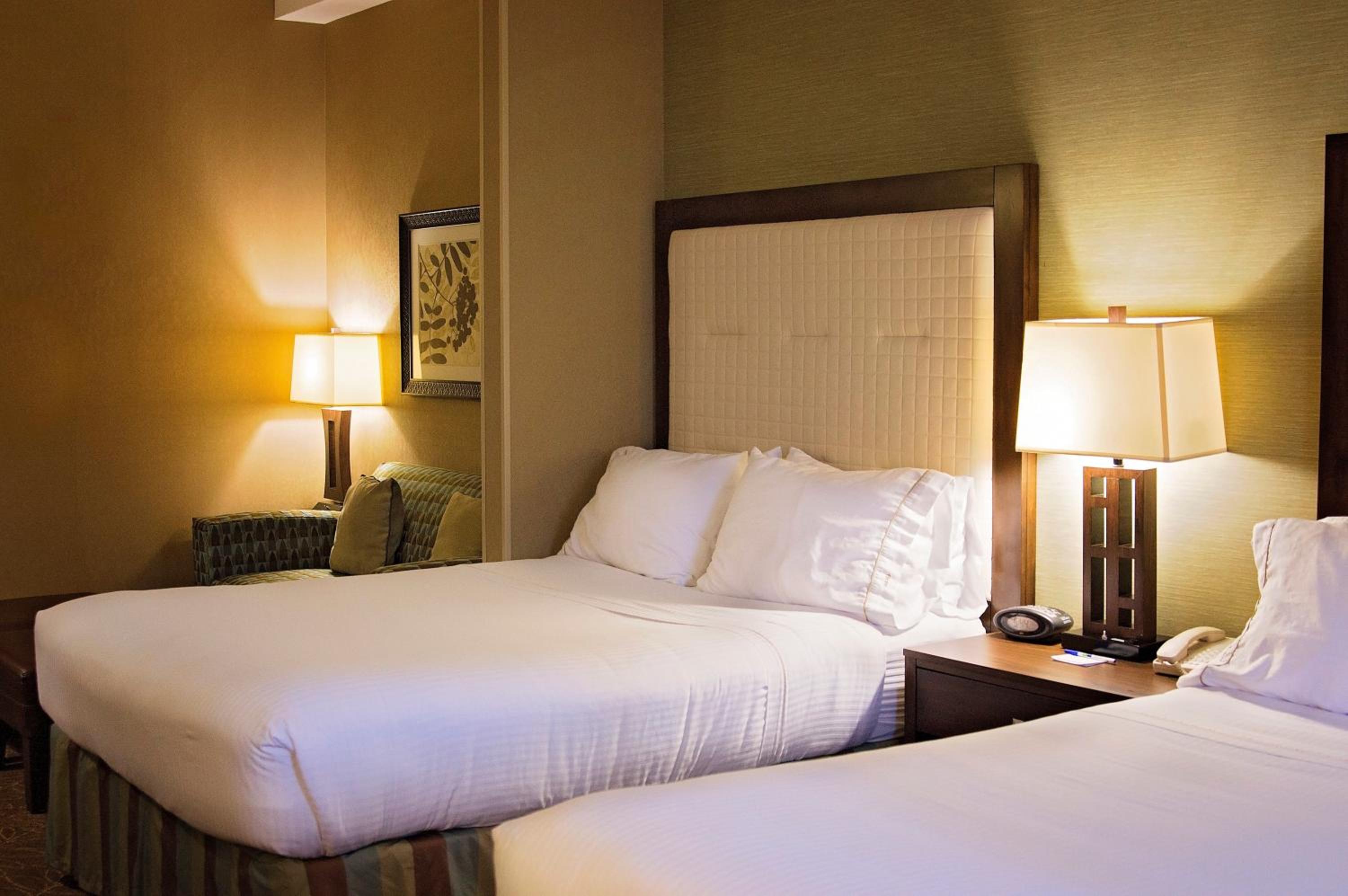 Queen Suite with Two Queen Beds and Sofa Bed - Photo 1