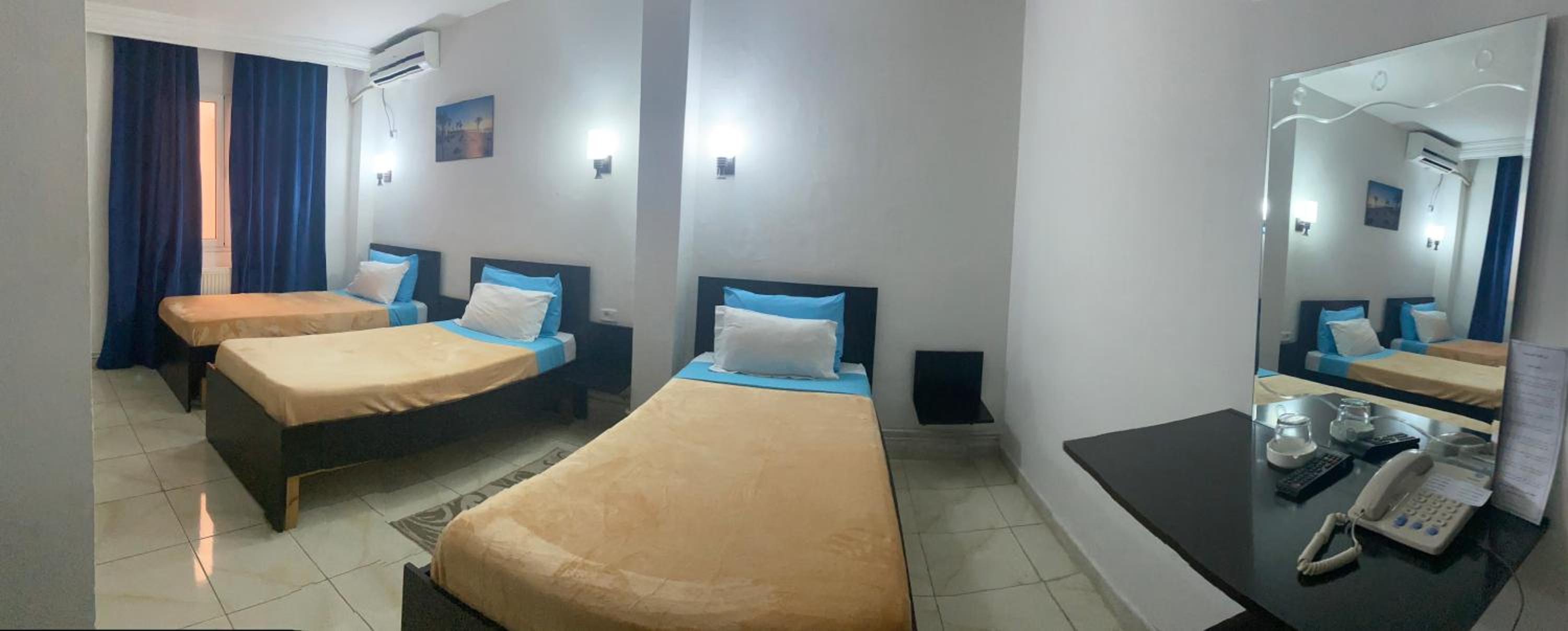 Triple Room with Private Bathroom photo 2