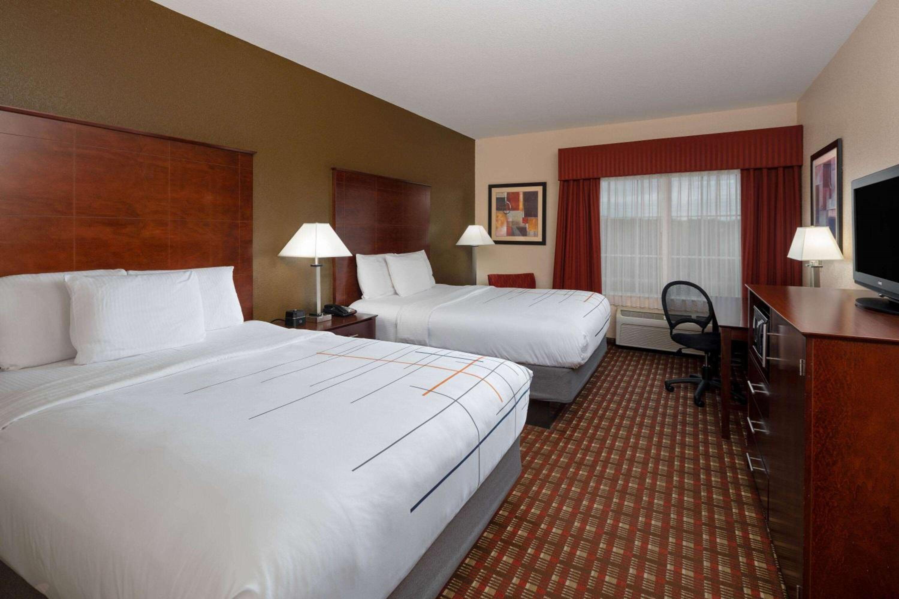 Deluxe Queen Room with Two Queen Beds - Photo 1