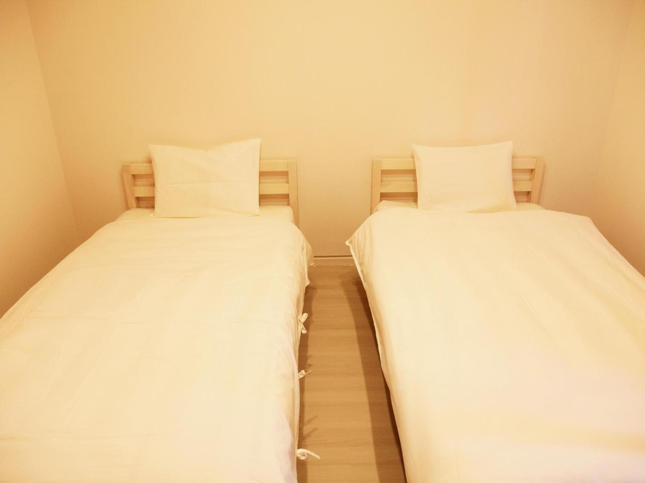 Standard Twin Room - Photo 8