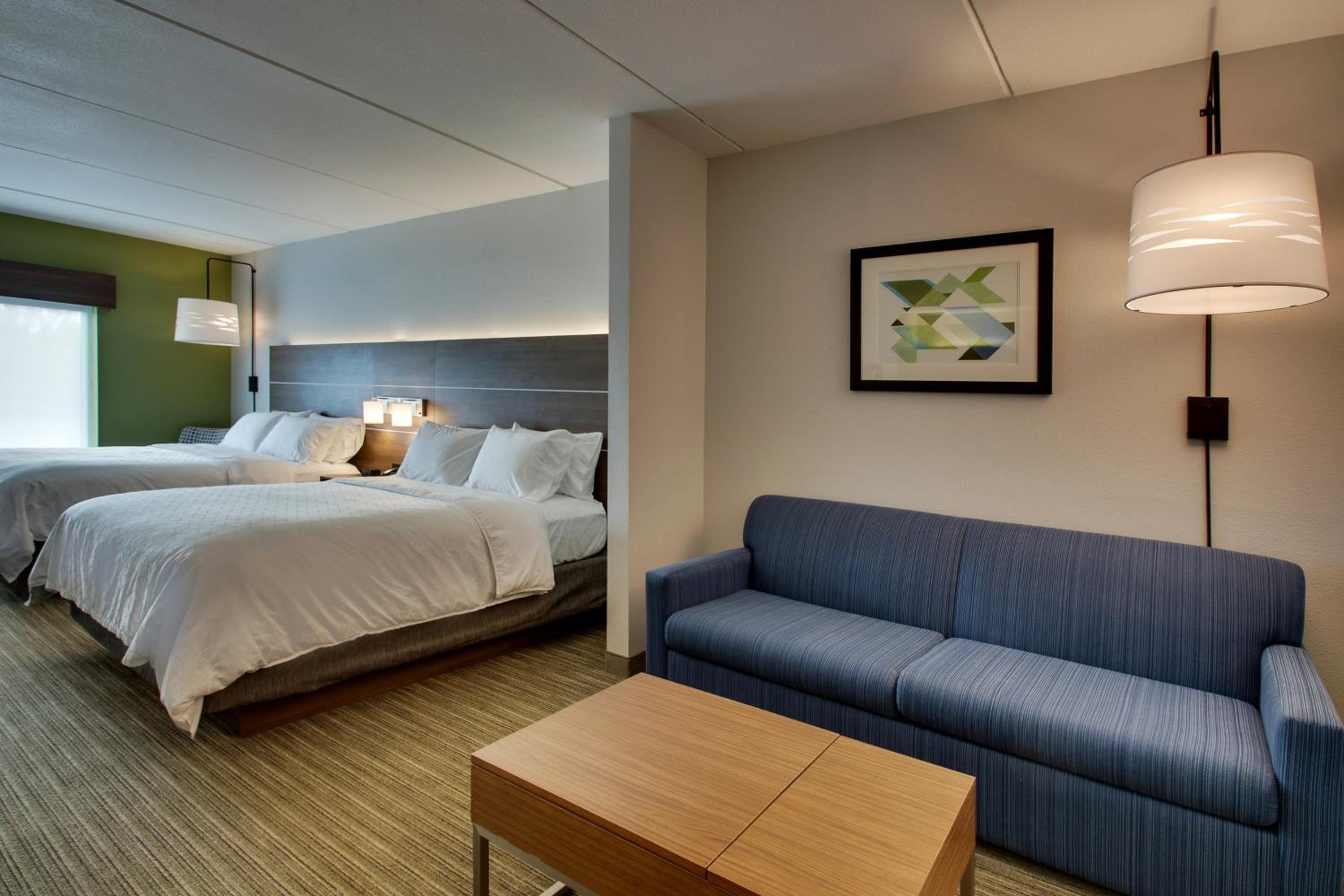 Queen Suite with Two Queen Beds and Sofa Bed - Photo 1