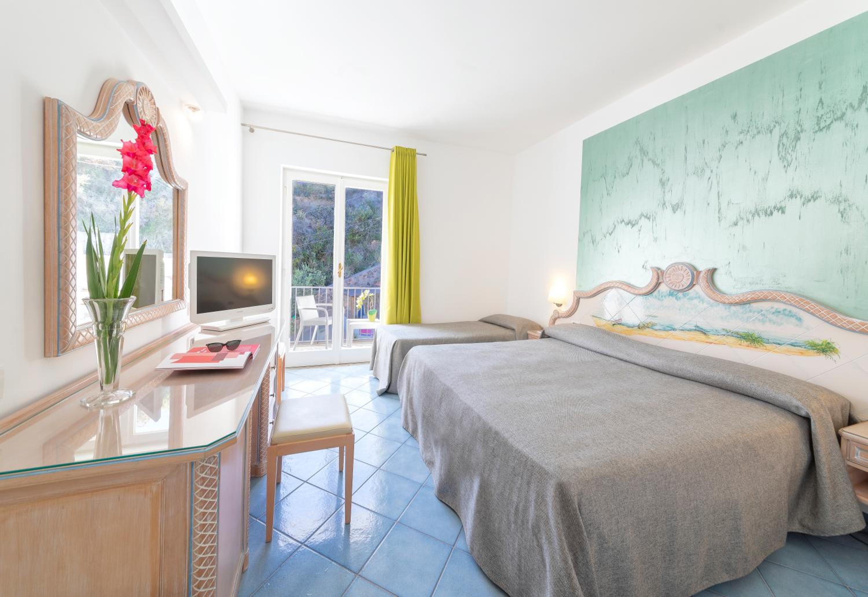 Quadruple Room (2 Adults + 2 Children)