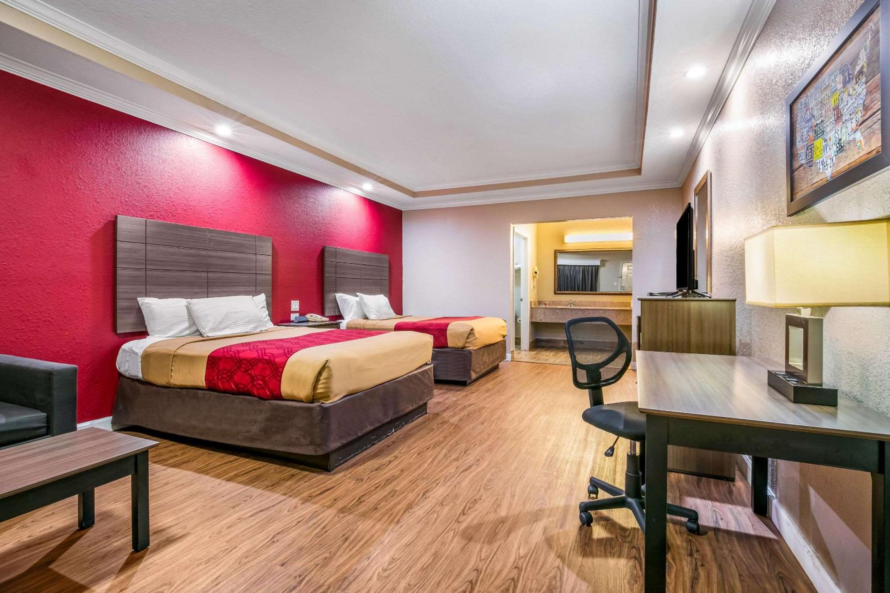 Queen Room with Two Queen Beds - Smoking - Photo 1