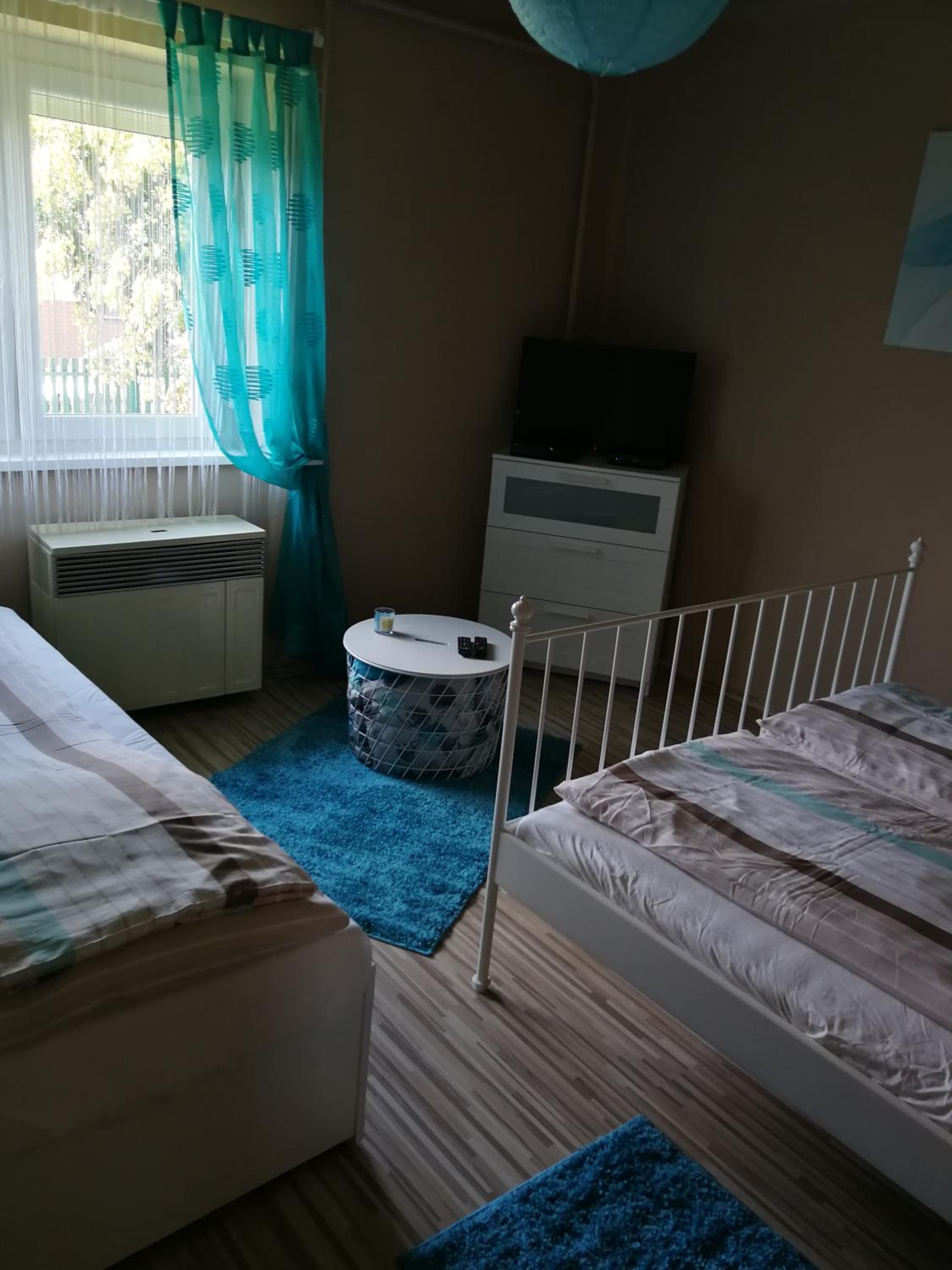 Three-Bedroom Apartment - Photo 1