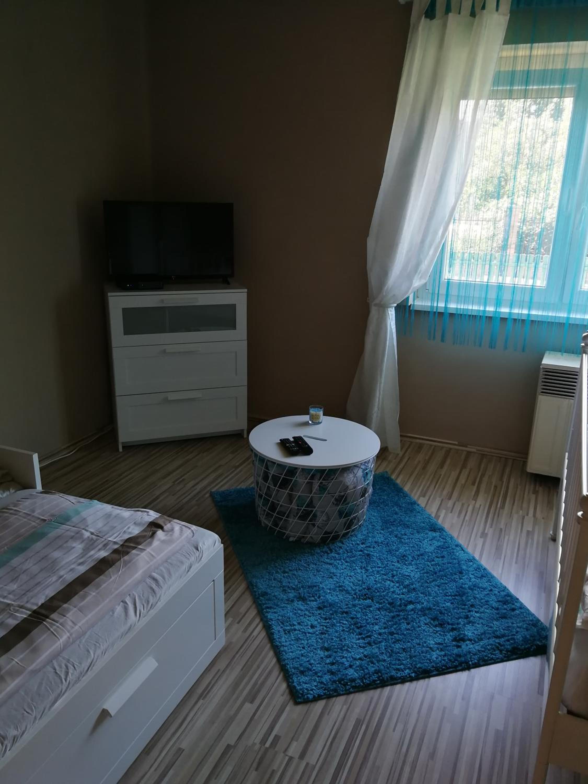 Three-Bedroom Apartment - Photo 29