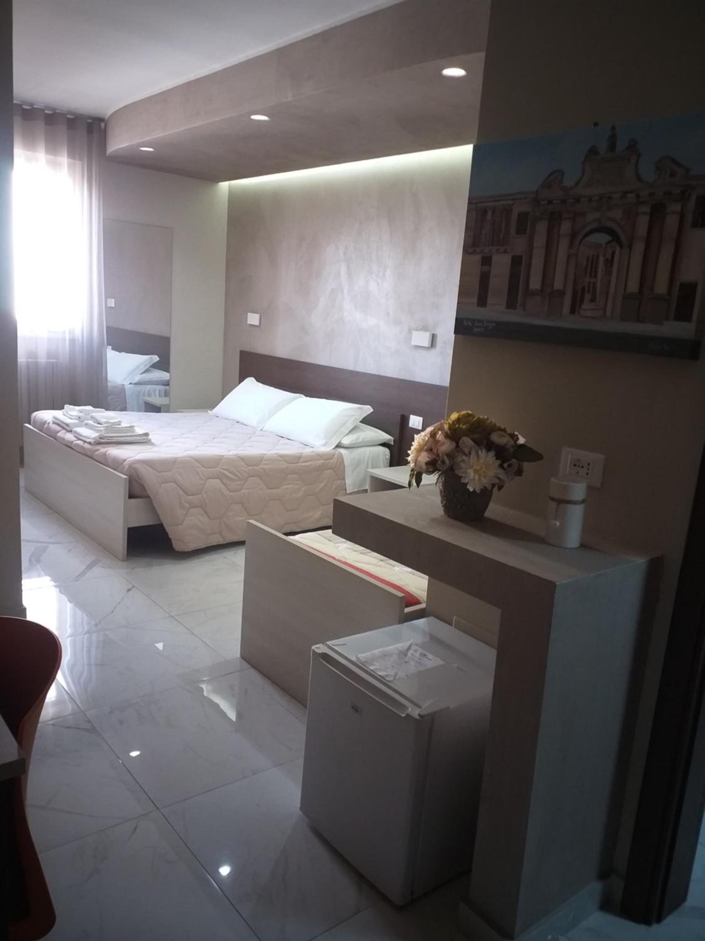 Quadruple Room with Private Bathroom