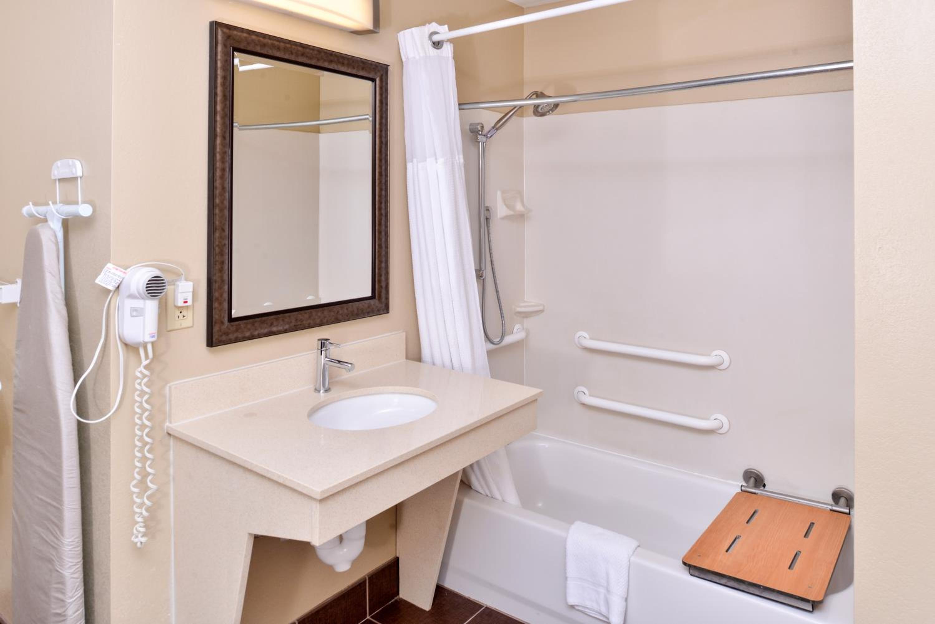One Bedroom Suite with Queen Bed and Hearing Accessible Roll In Shower - Non-Smoking