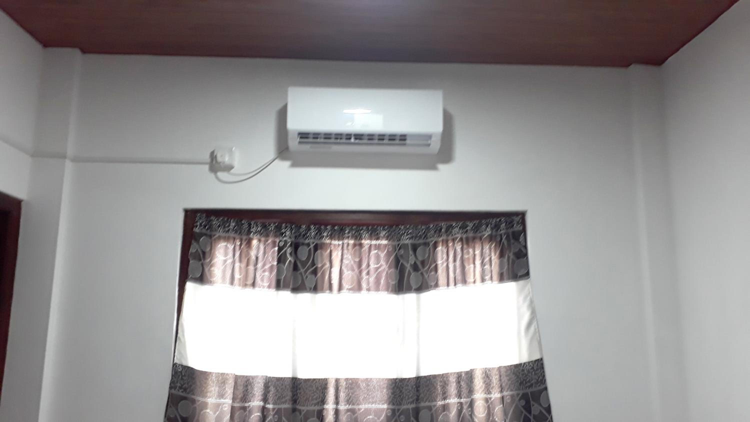 Deluxe Room with A/C (2 Adults + 1 Child) photo 1