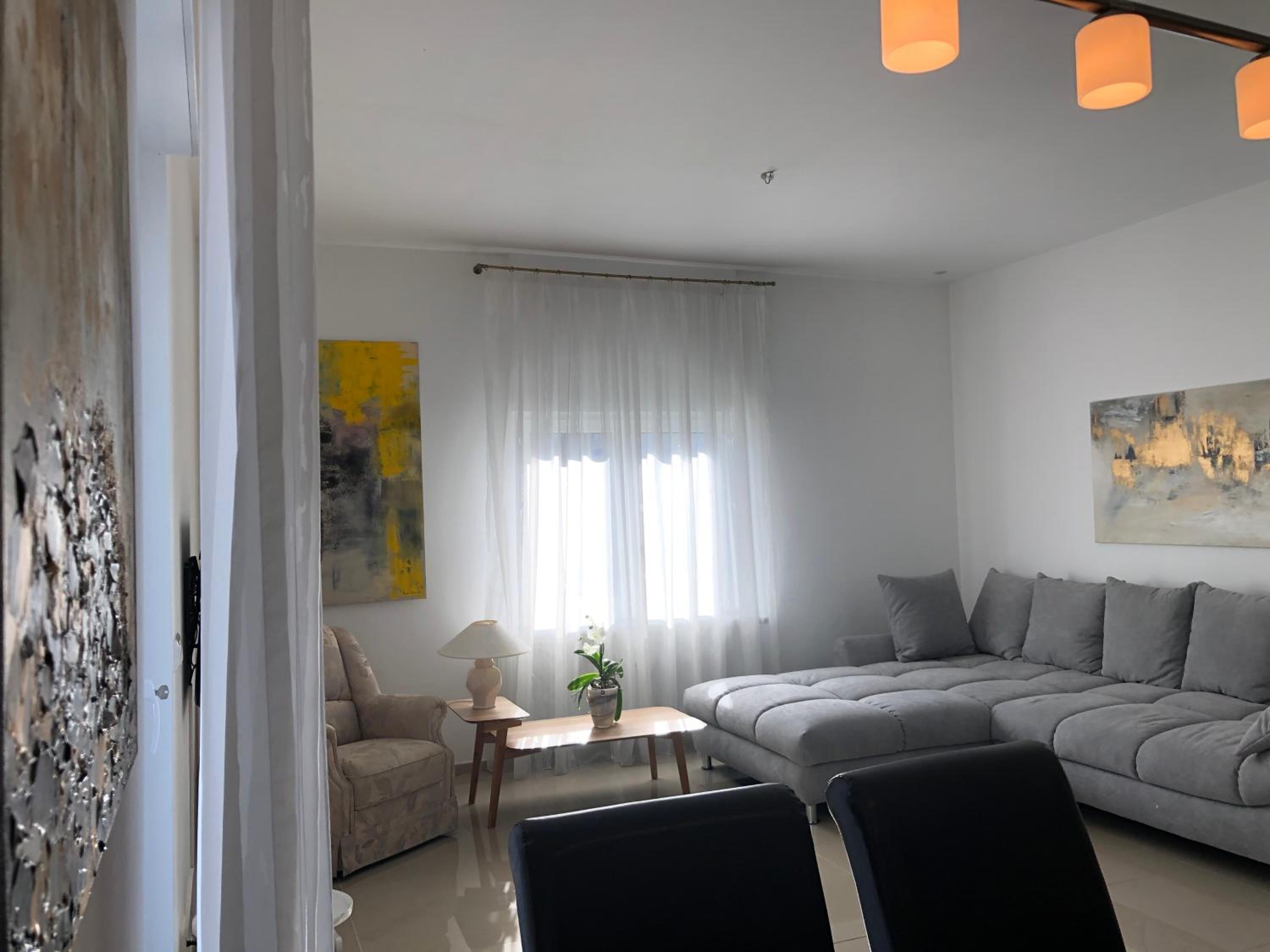 Three-Bedroom Apartment photo 1