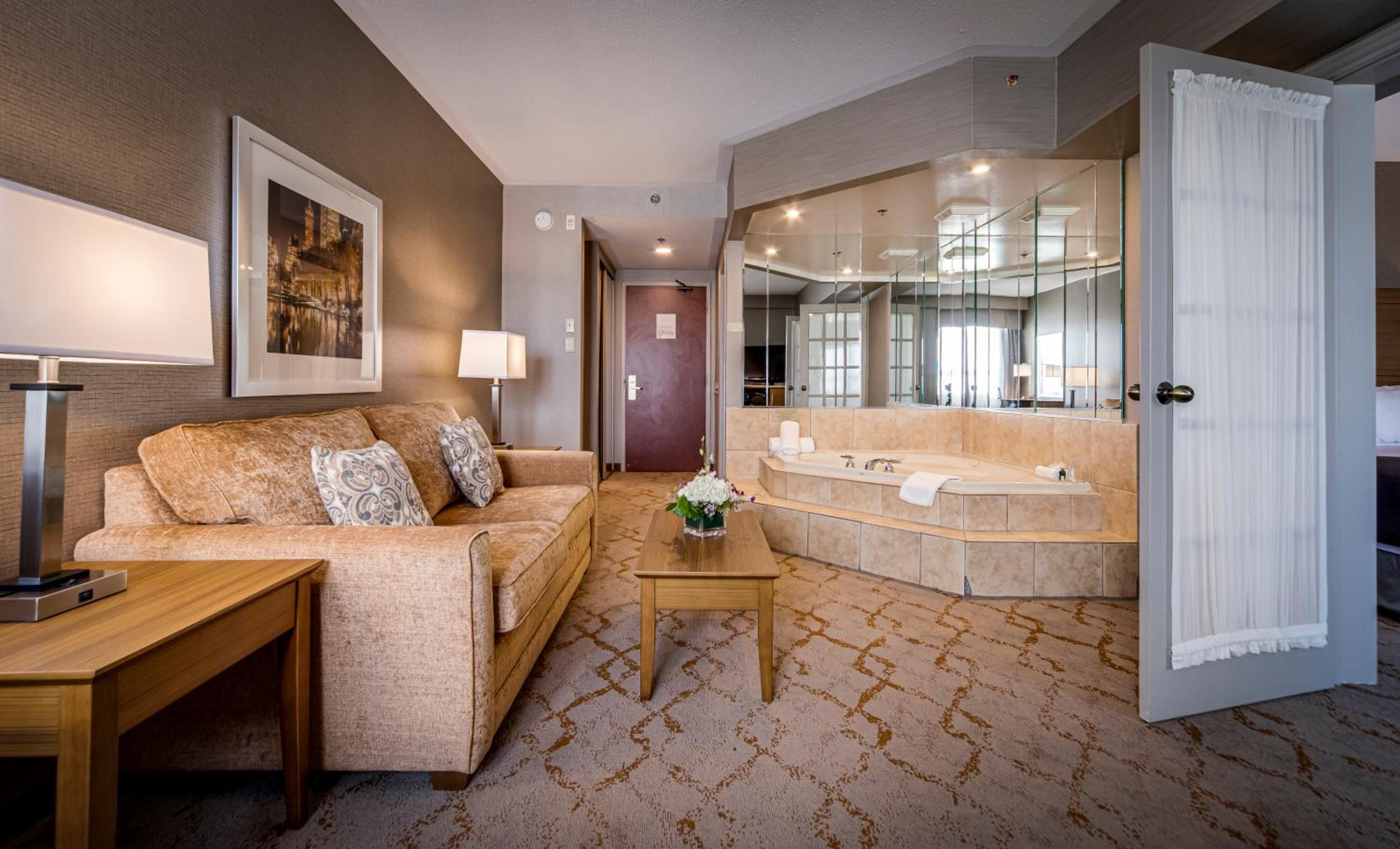 Deluxe King Suite with Jetted Tub and Living Room photo 1