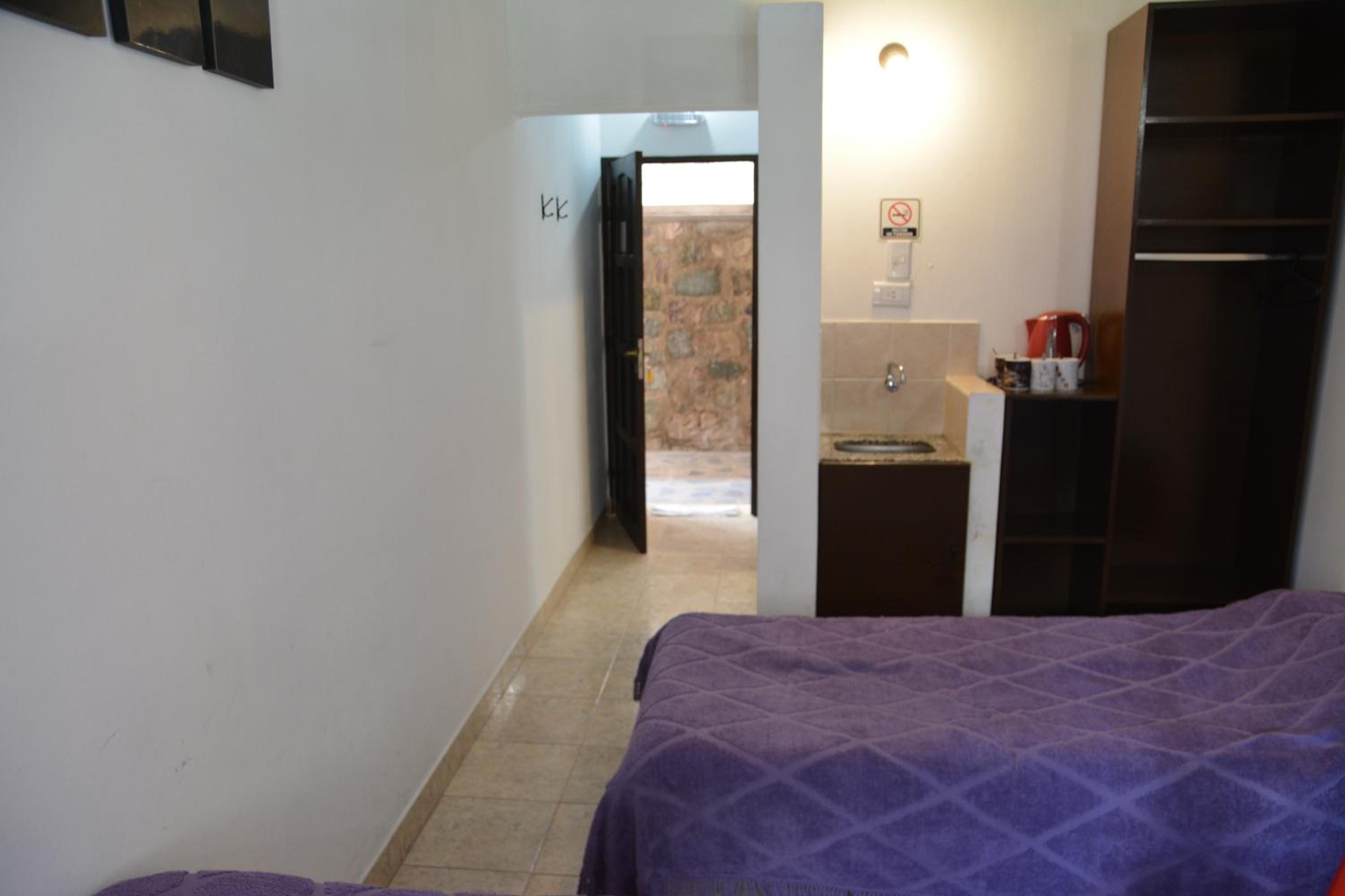 Quadruple Room with Private Bathroom