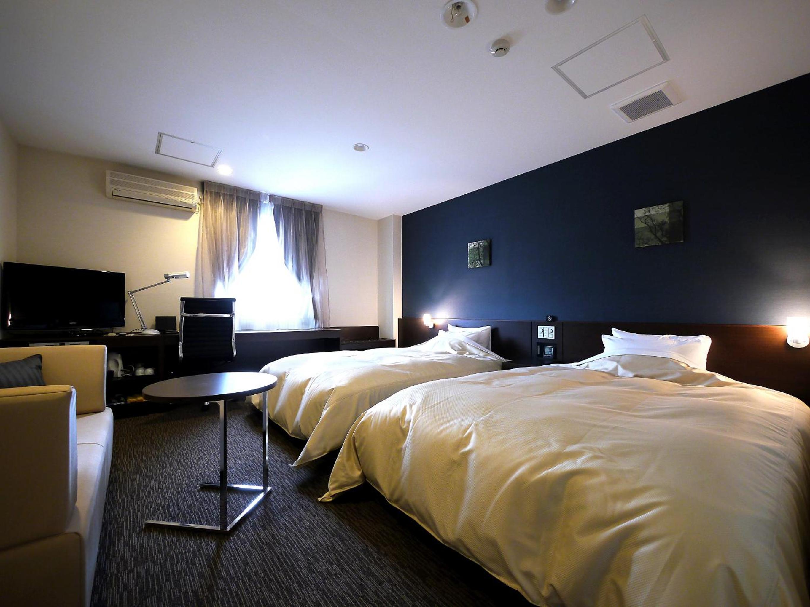 Twin Room - Non-Smoking - Photo 1