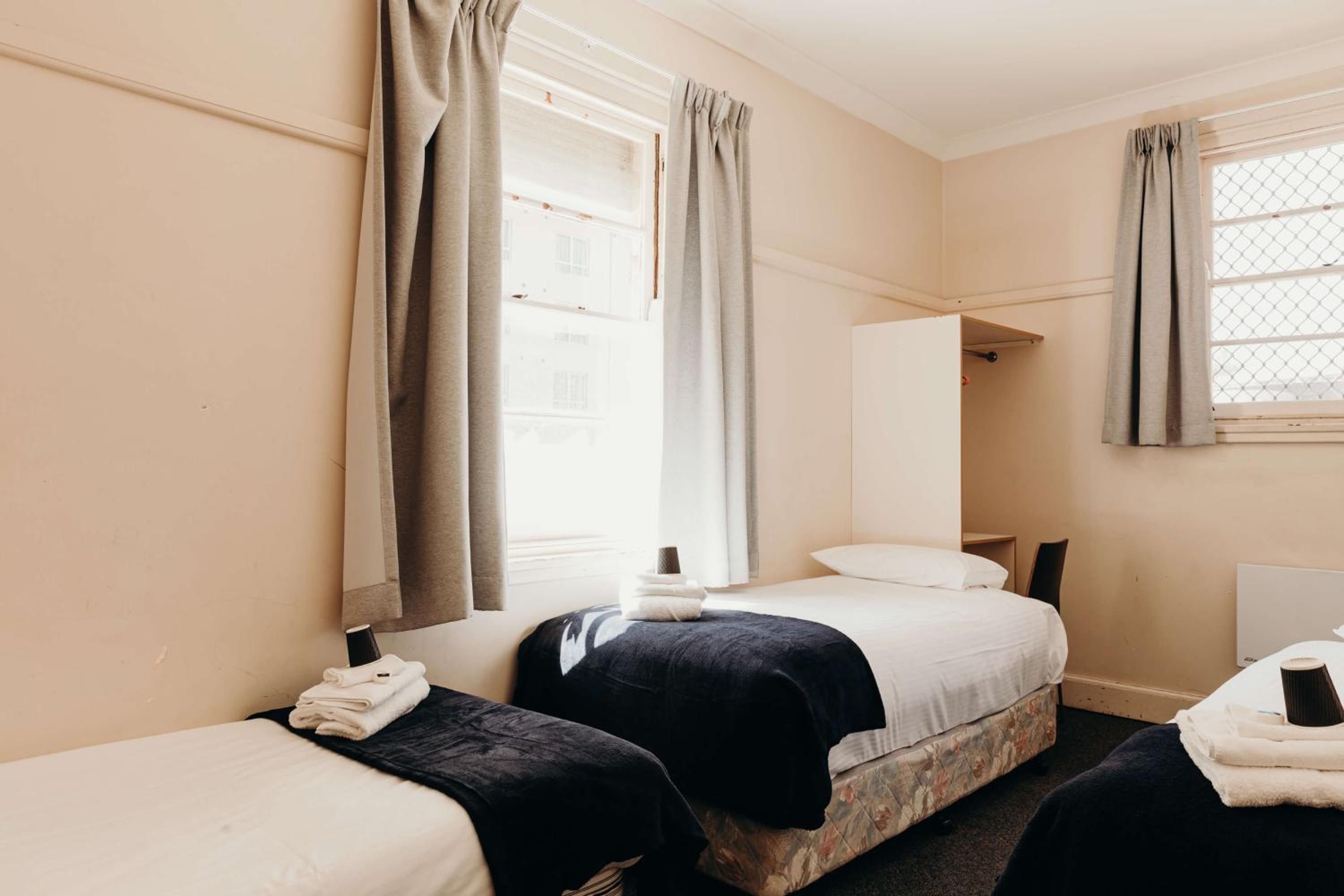 Triple Room (Shared Bathroom)