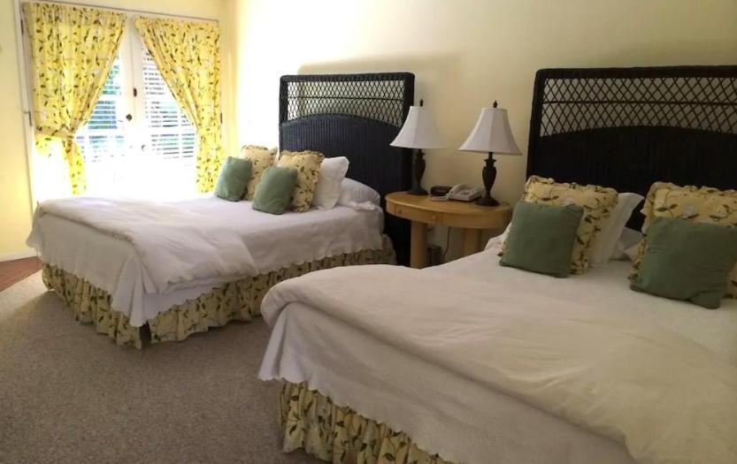 Queen Room with Two Queen Beds - Photo 1
