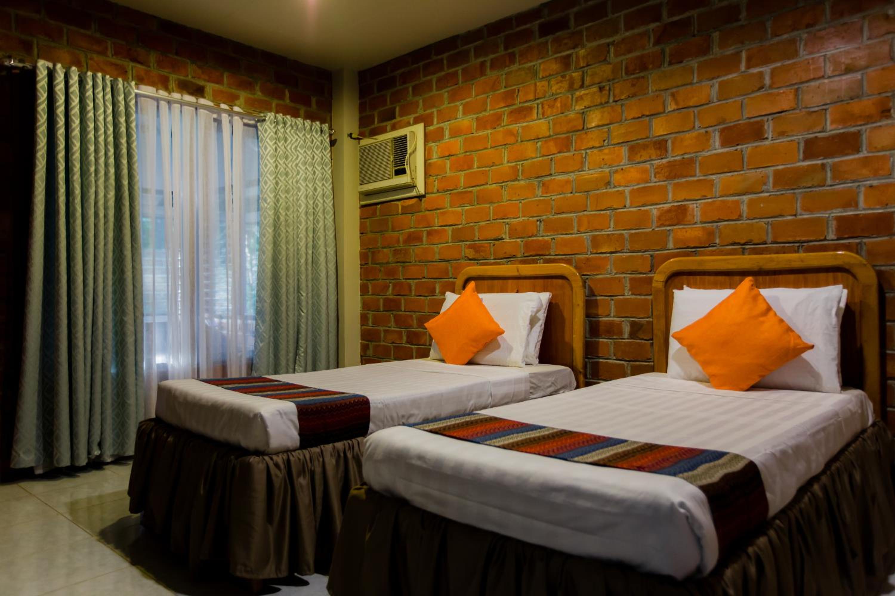 Deluxe Queen Room with Two Queen Beds - Photo 1