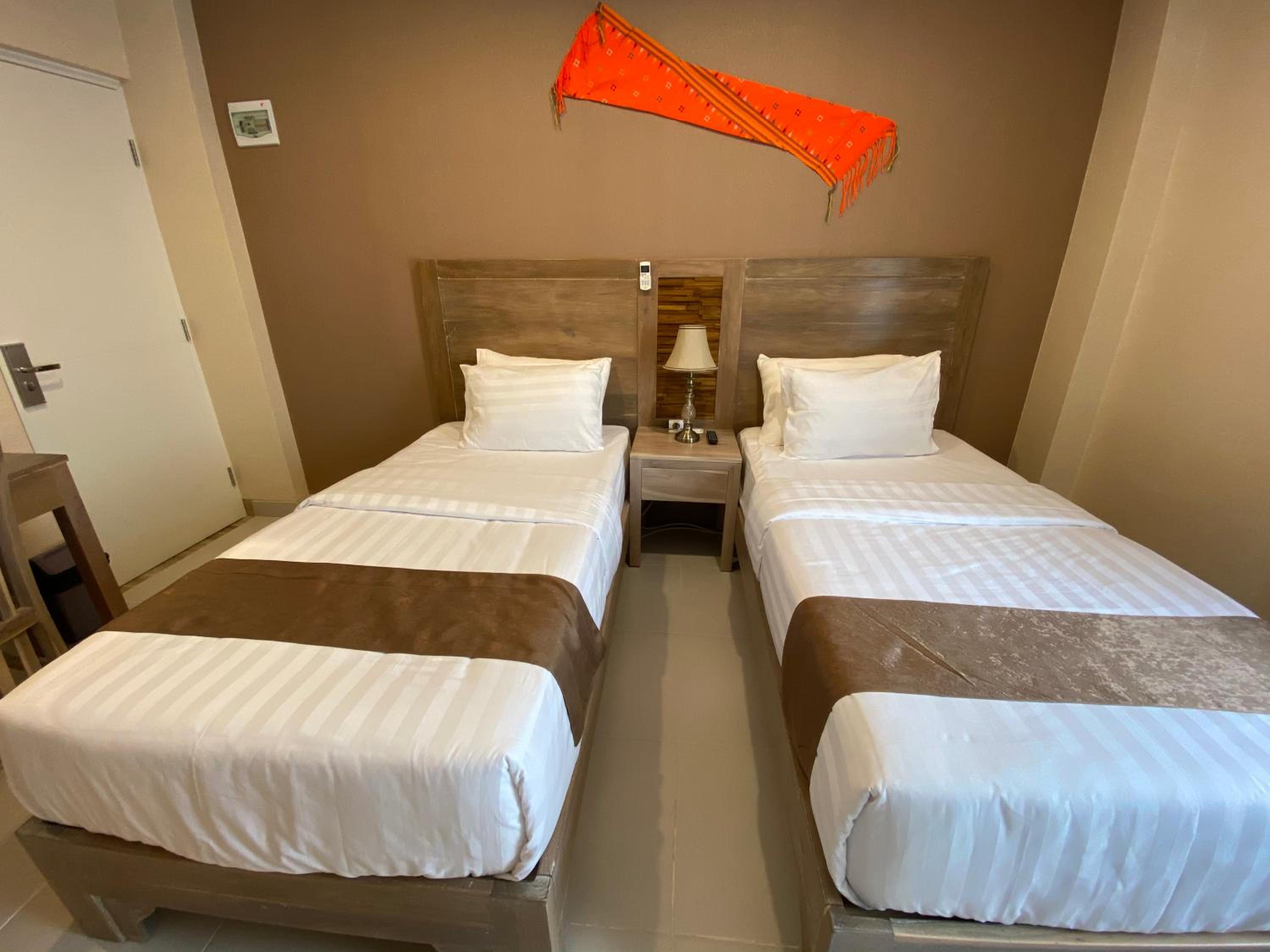 Standard Twin Room - Photo 1