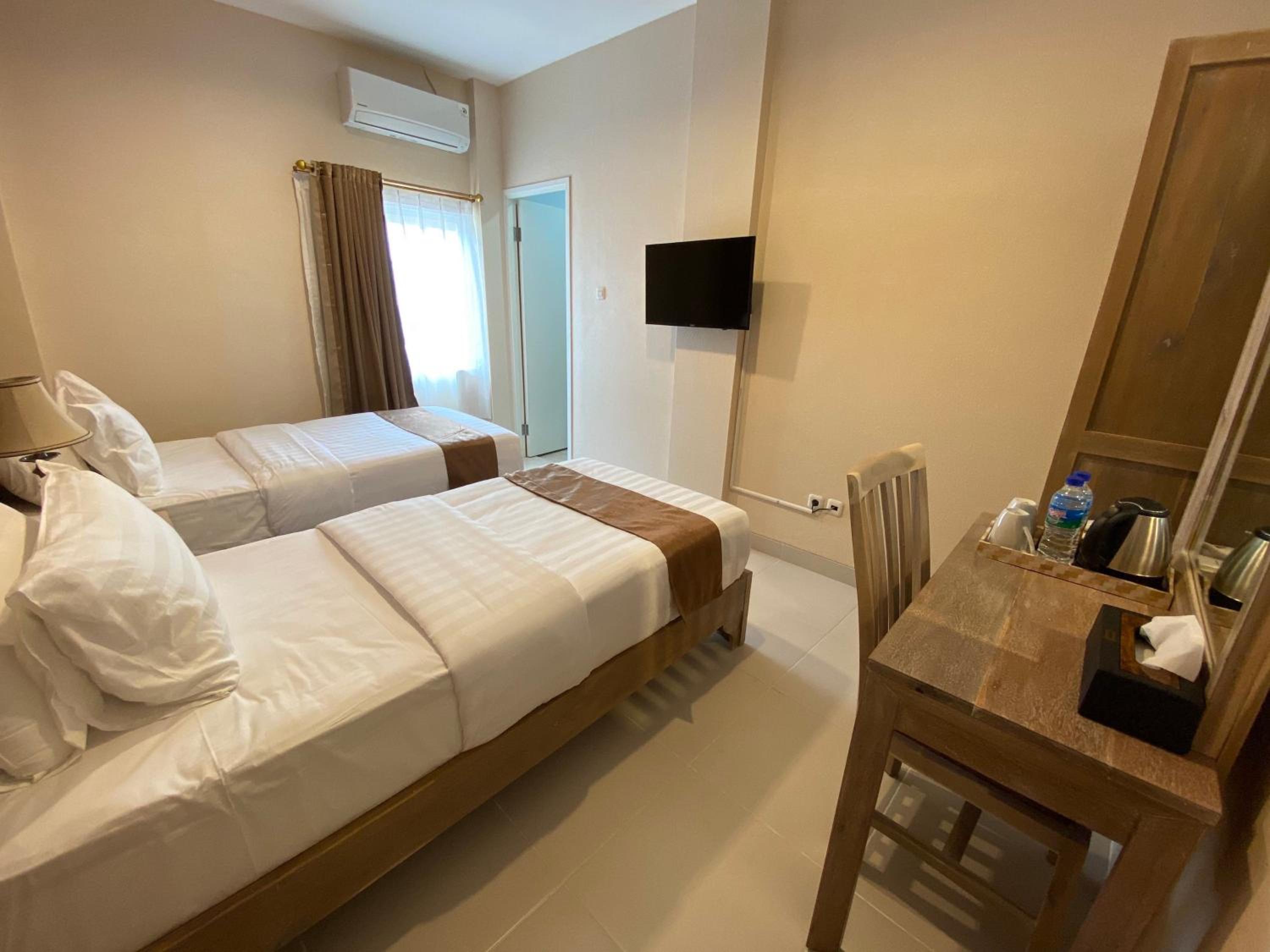 Standard Twin Room - Photo 5